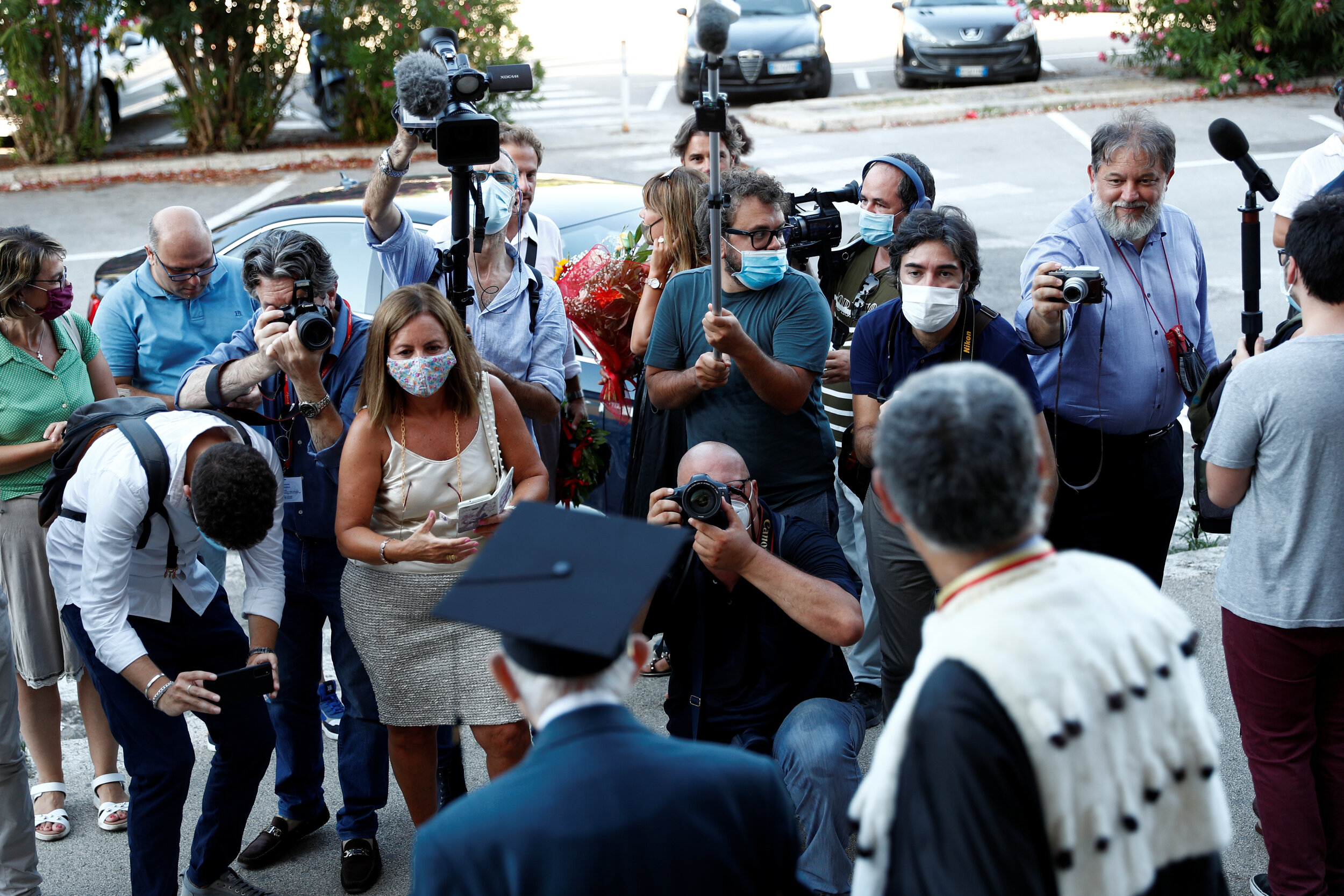  Giuseppe Paterno, 96, Italy's oldest student, poses for the media as he attends his graduation after completing his undergraduate degree in history and philosophy at the University of Palermo, in Palermo, Italy, July 29, 2020.  