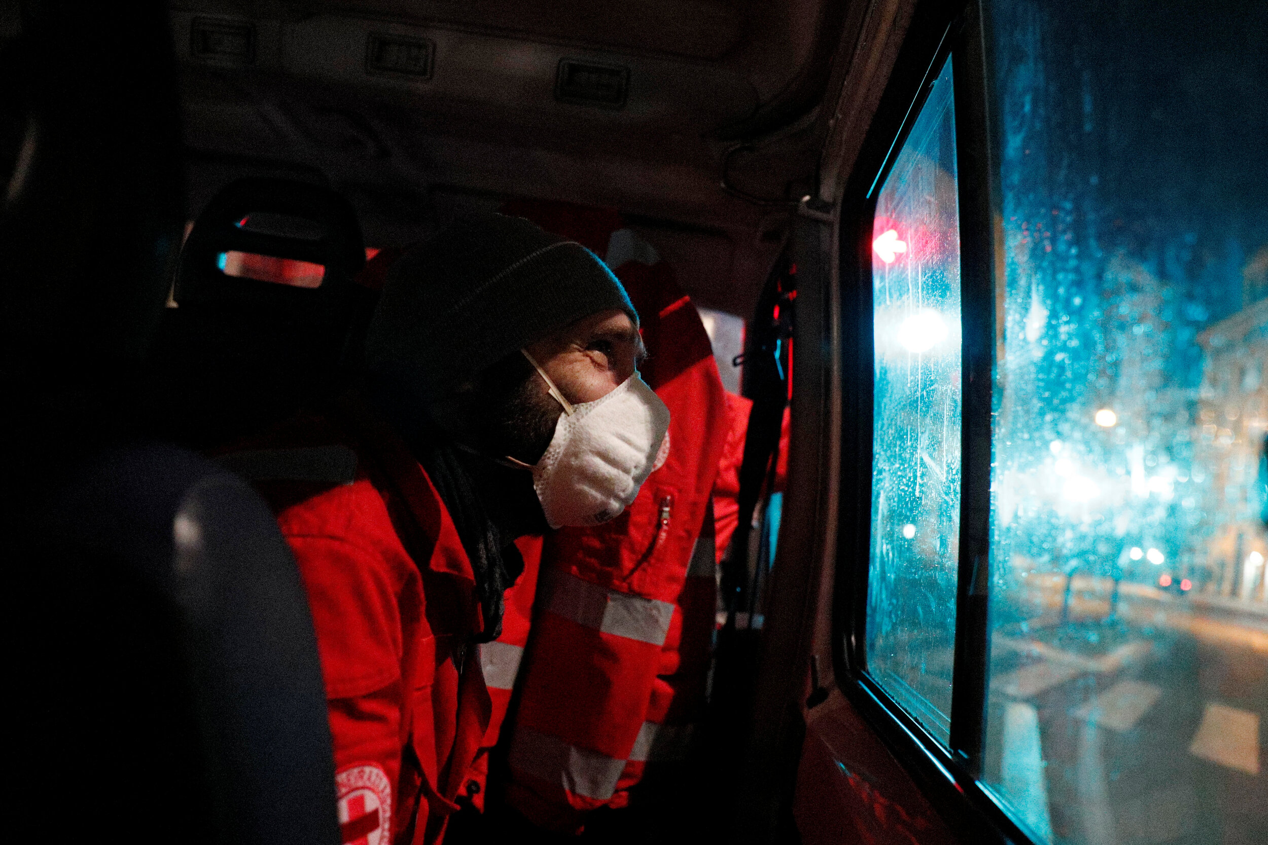  Red Cross worker Giorgio Vacirca, 43, looks out of van to spot homeless people in Rome, Italy, March 17, 2020. Since the coronavirus crisis, Red Cross workers have been increasing their daily activities to meet the growing needs of the homeless in R