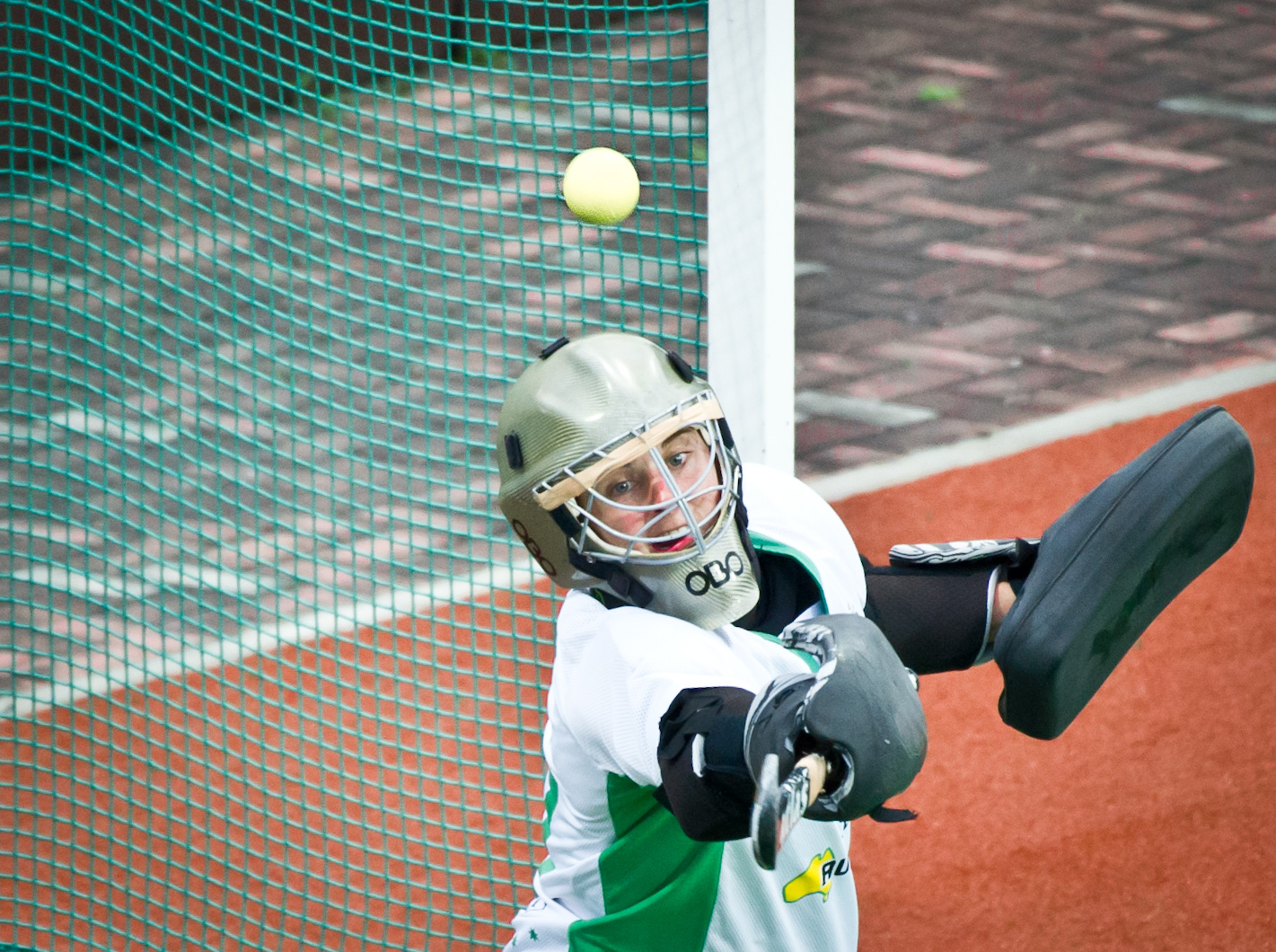 An Australian goal keeper looks on as the ball passes her during the TPG international tri series hockey match at the Sengkang Sports Complex.