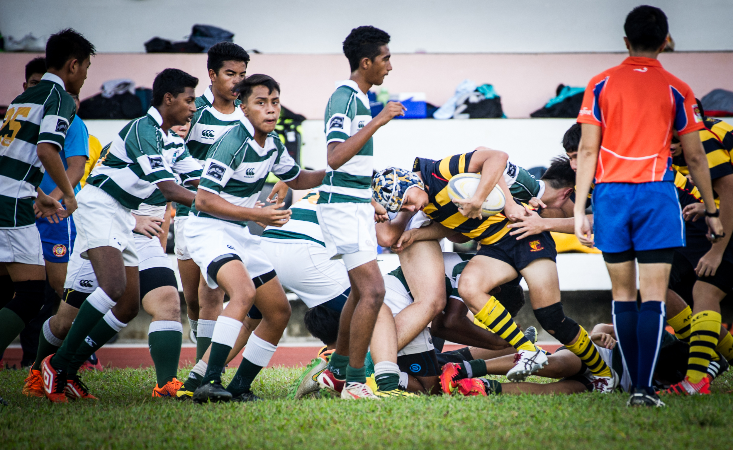 Schoolboys during a schools rugby match at the old National Institute of Education field at Evans Road.