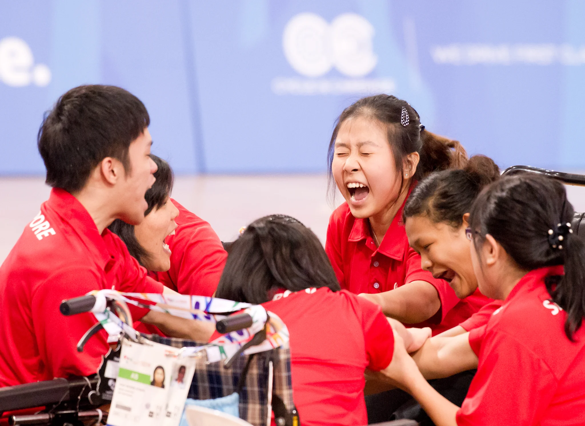Boccia players prepare to cheer during the ASEAN Para Games at the OCBC Arena.
