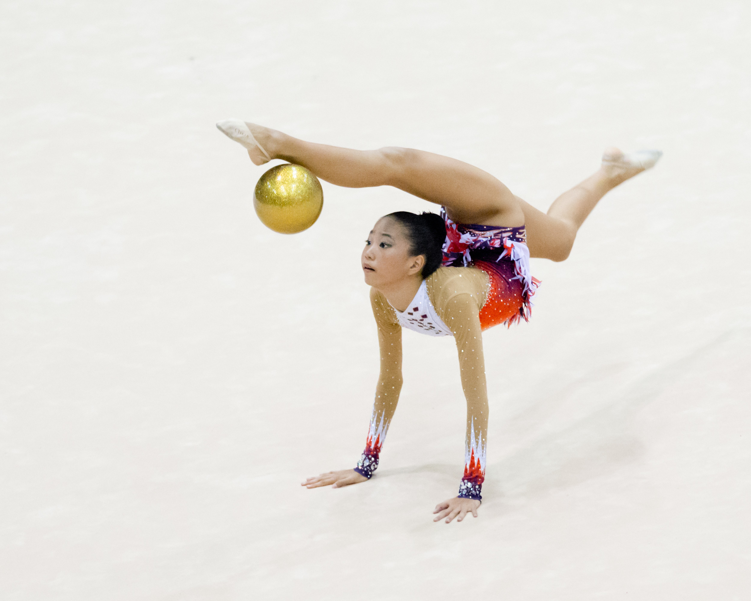 A gymnast bounces her ball during the Singapore Open at the Bishan Sports Hall.