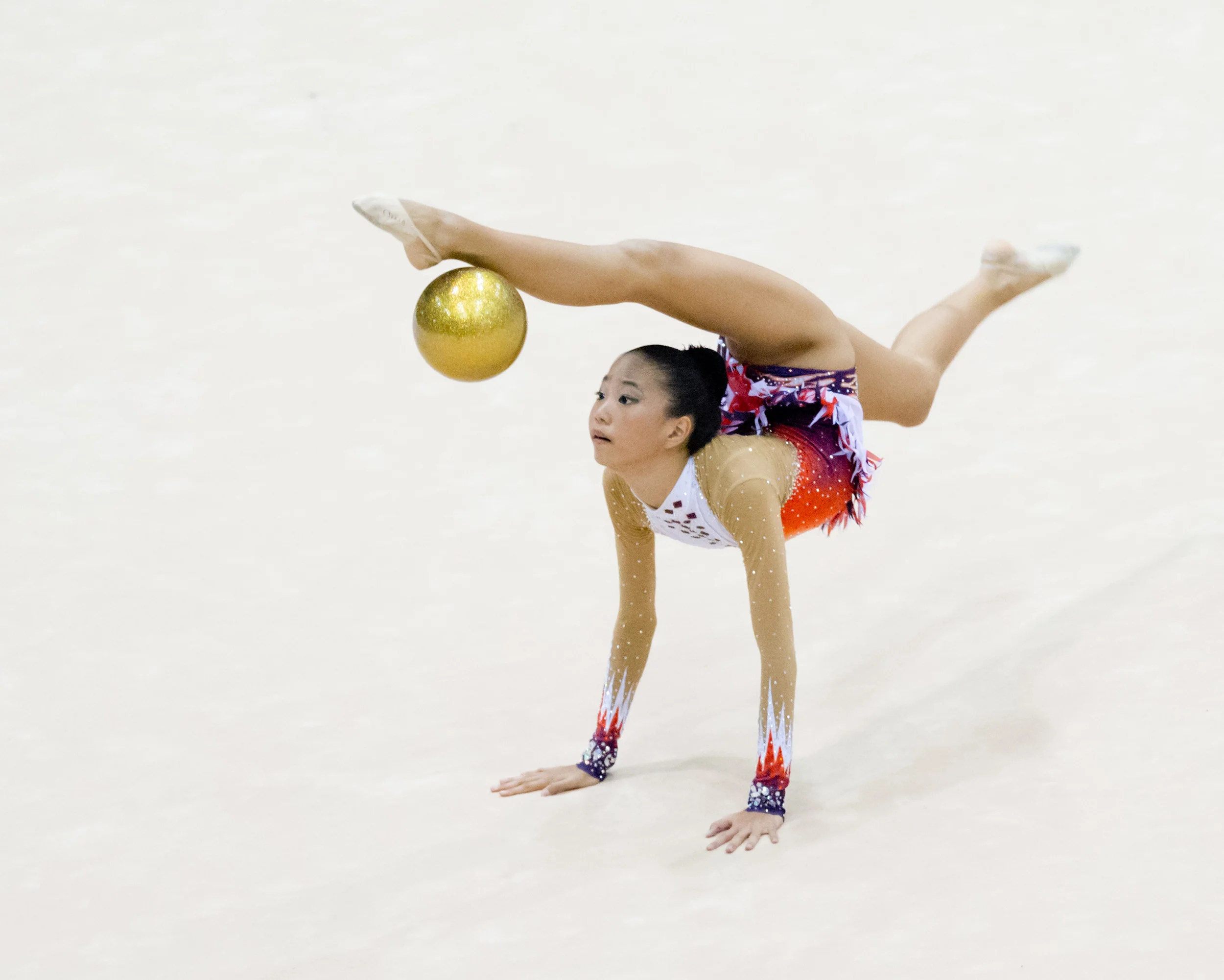A gymnast bounces her ball during the Singapore Open at the Bishan Sports Hall.