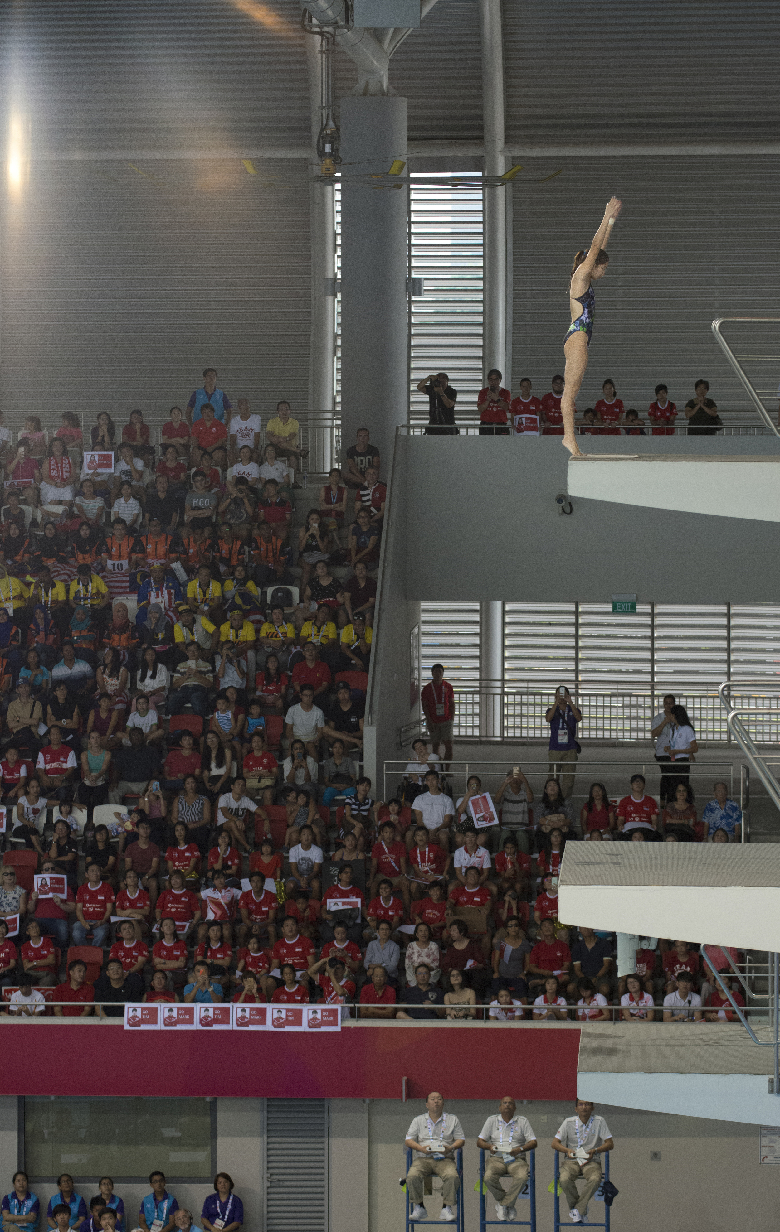 A diver prepares to take the plunge during the 10m diving finals of the SEA Games at the OCBC Aquatic Centre.