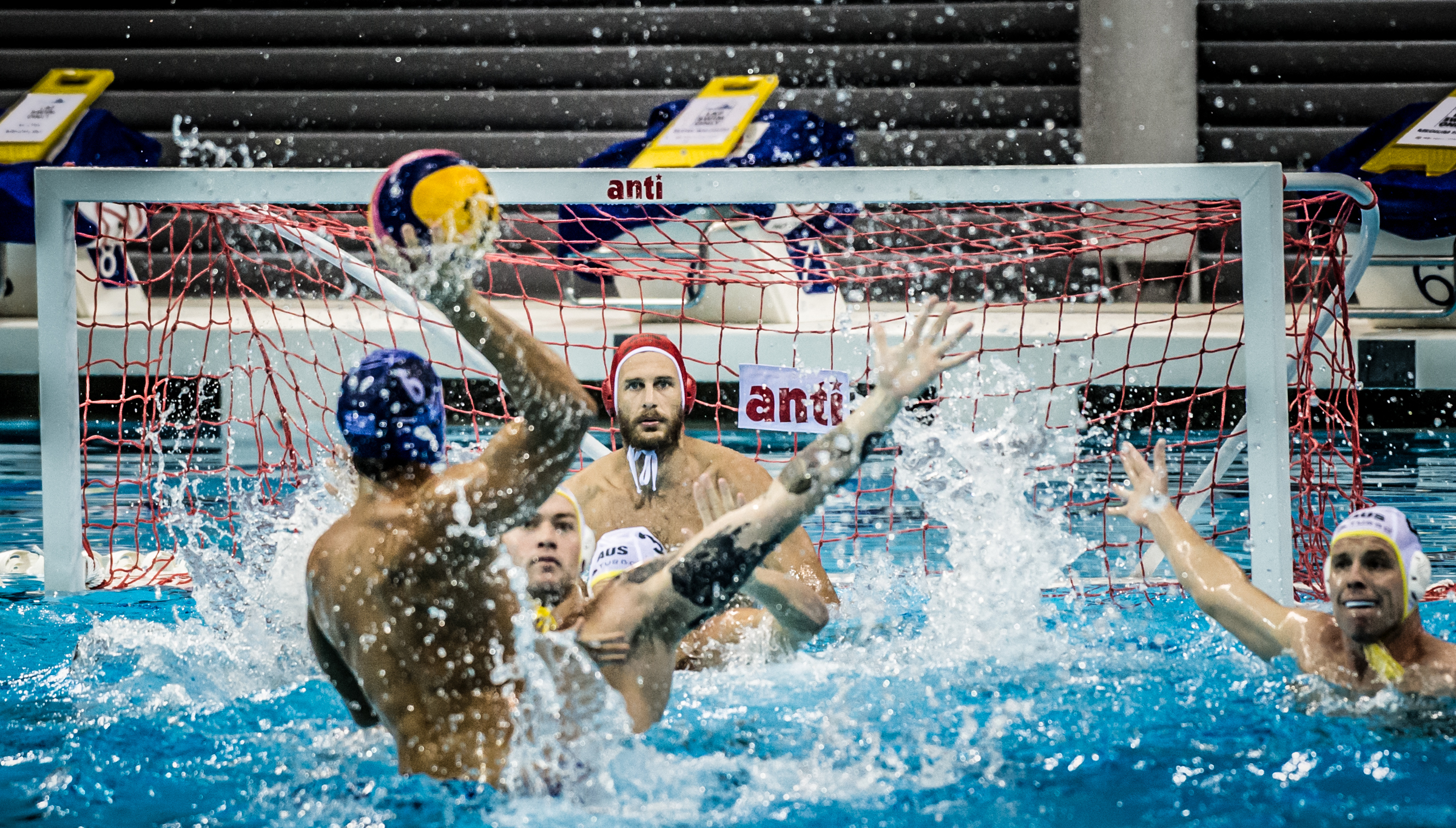 A Greek player prepares to score against Australia during the Greece vs Australia pre-Olympic sparring match at the OCBC Aquatic Centre.