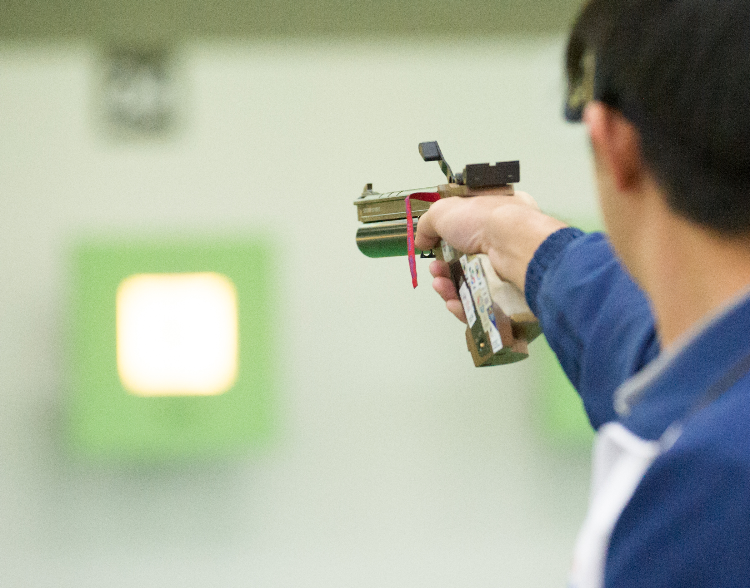 A Thai shooter takes aim during the shooting competition of the ASEAN University Games at Yishun SAFRA.