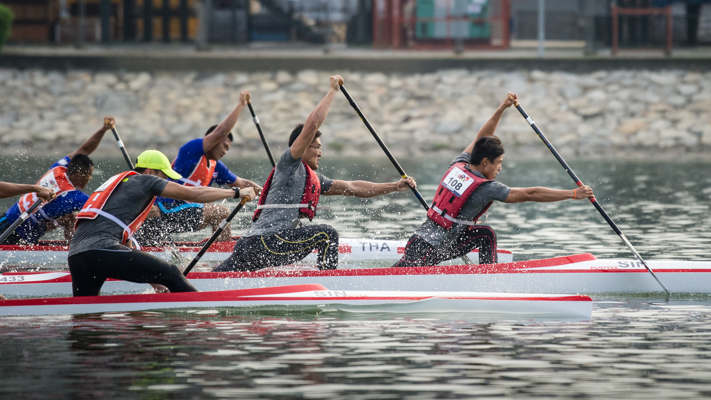 A Singaporean pair take an early lead in the Canoeing competition of the ASEAN University Games at the Marina Channel.