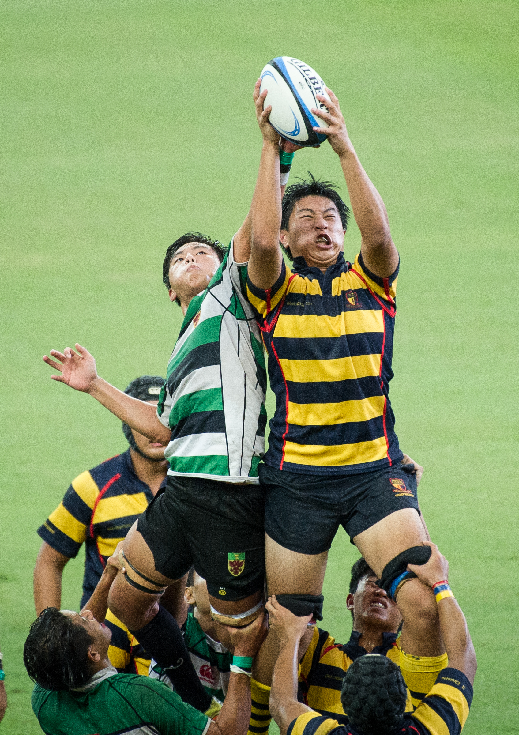 Schoolboys in a line out during a schools rugby match at the Singapore Sports Hub.