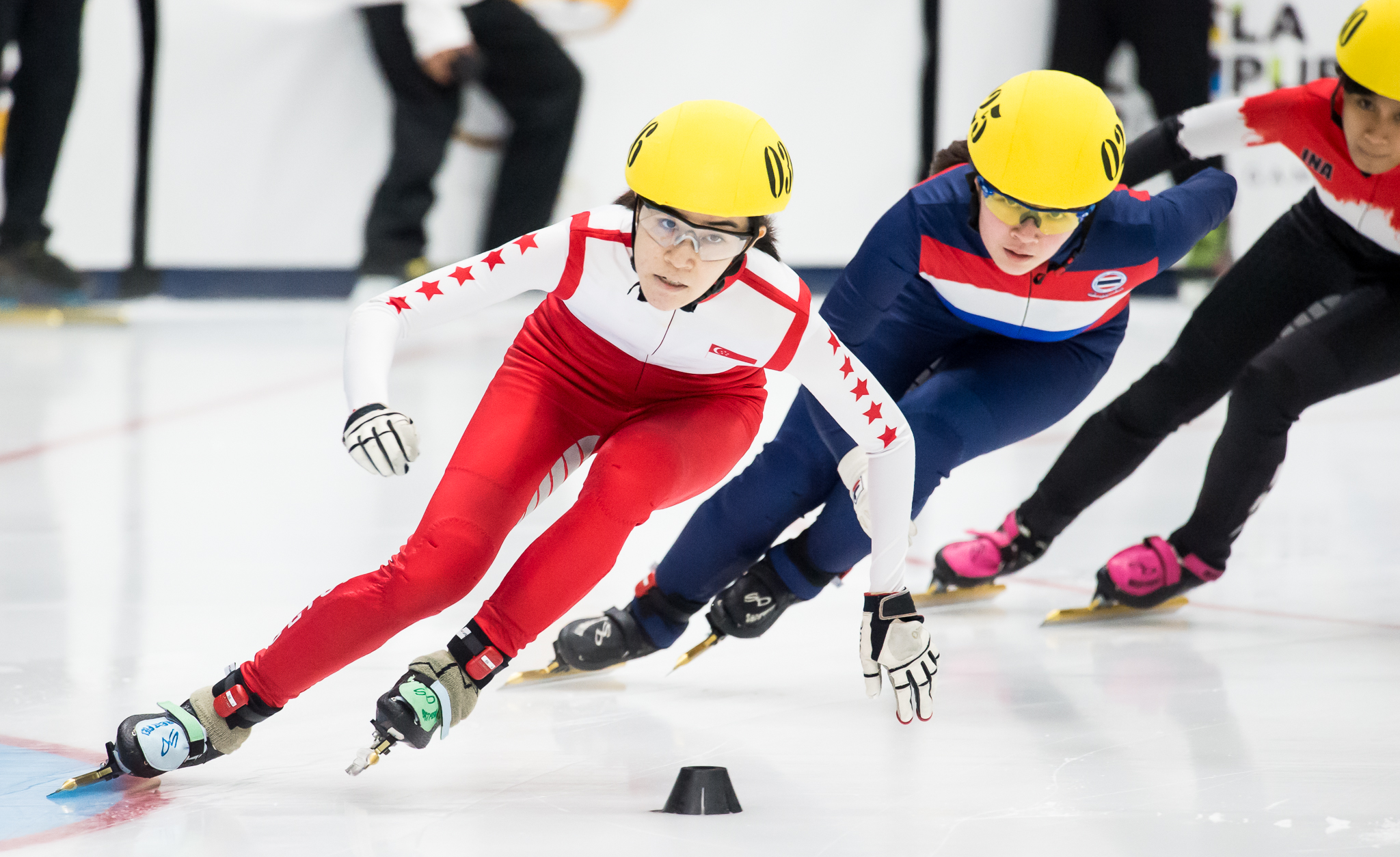Singaporean, Thai and Indonesian speed skaters in action during the SEA Games at the Empire City Skating Rink.