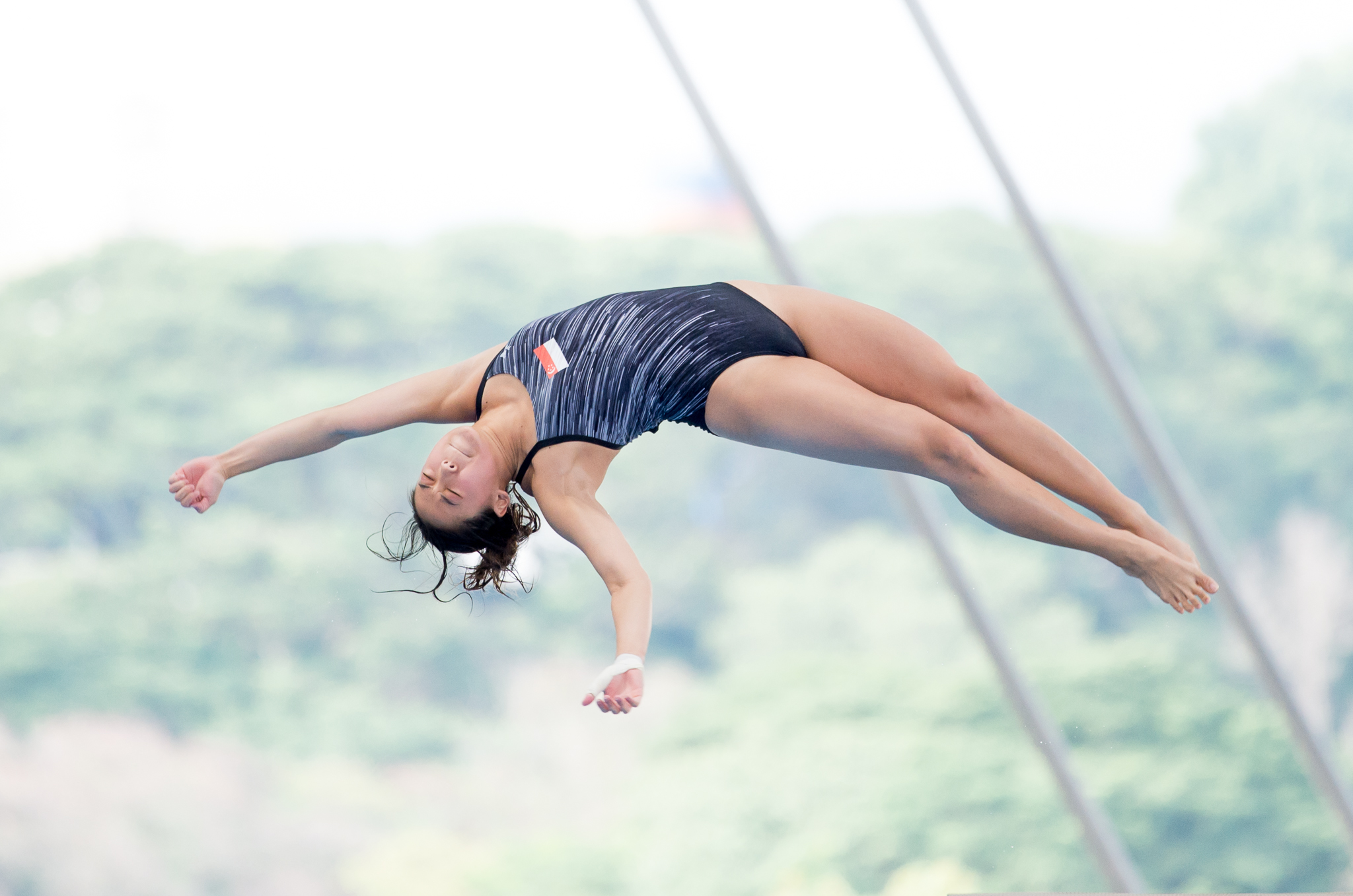 A Singaporean Diver in action during the SEA Games at the National Aquatic Centre, Bukit Jalil.