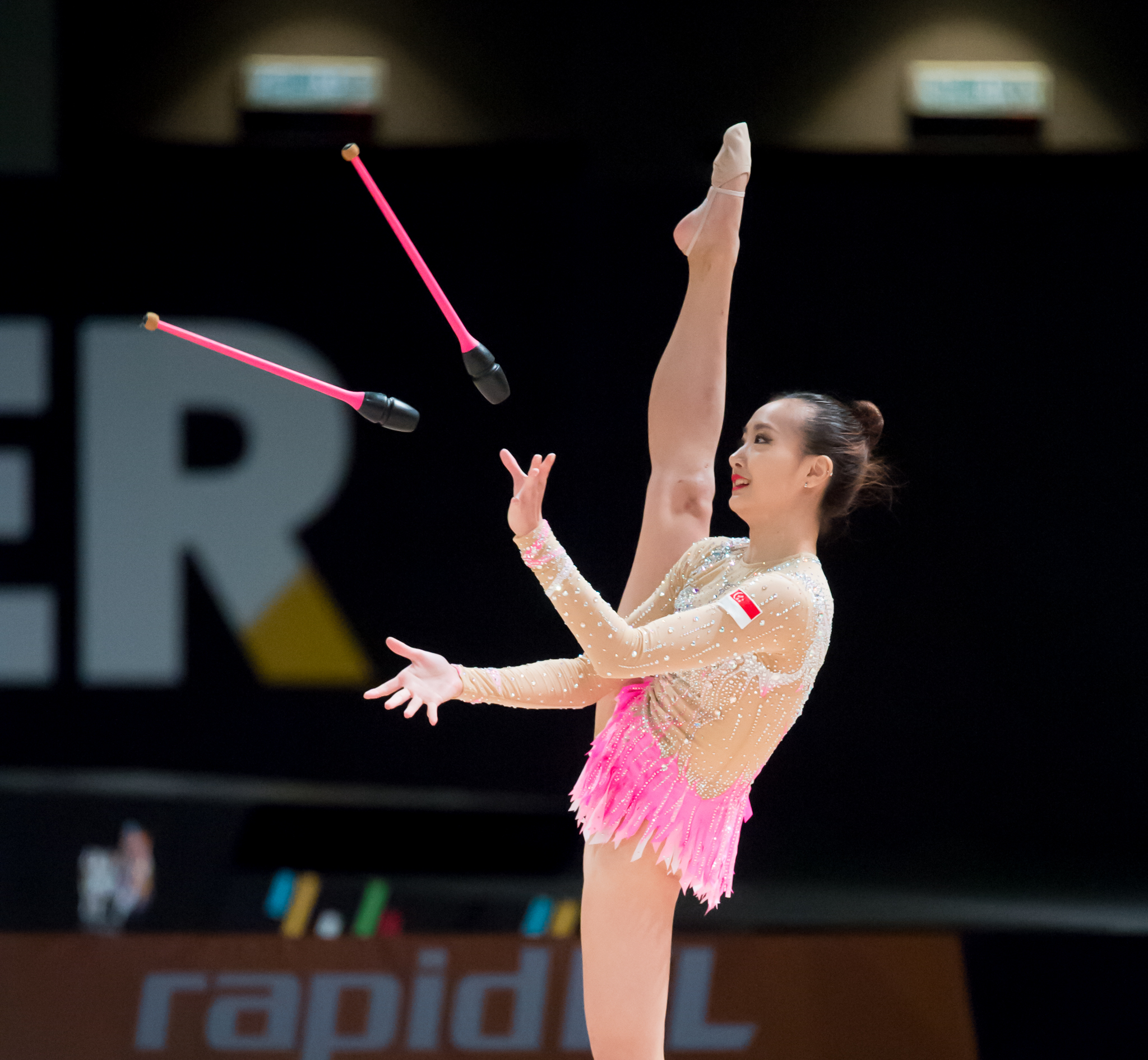 A Singaporean gymnast in action during the SEA Games at the Malaysian International Trade and Exhibition Centre.