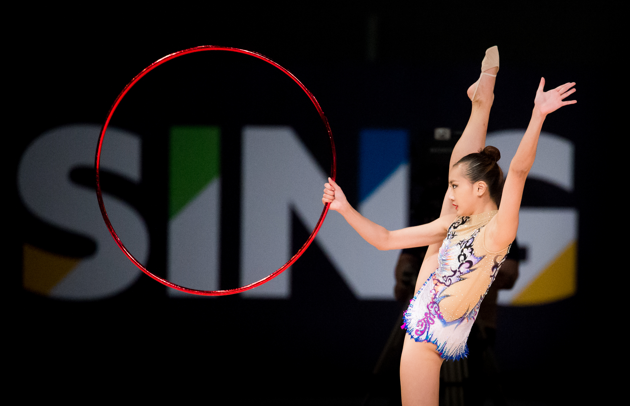A Singaporean gymnast in action during the SEA Games at the Malaysian International Trade and Exhibition Centre.