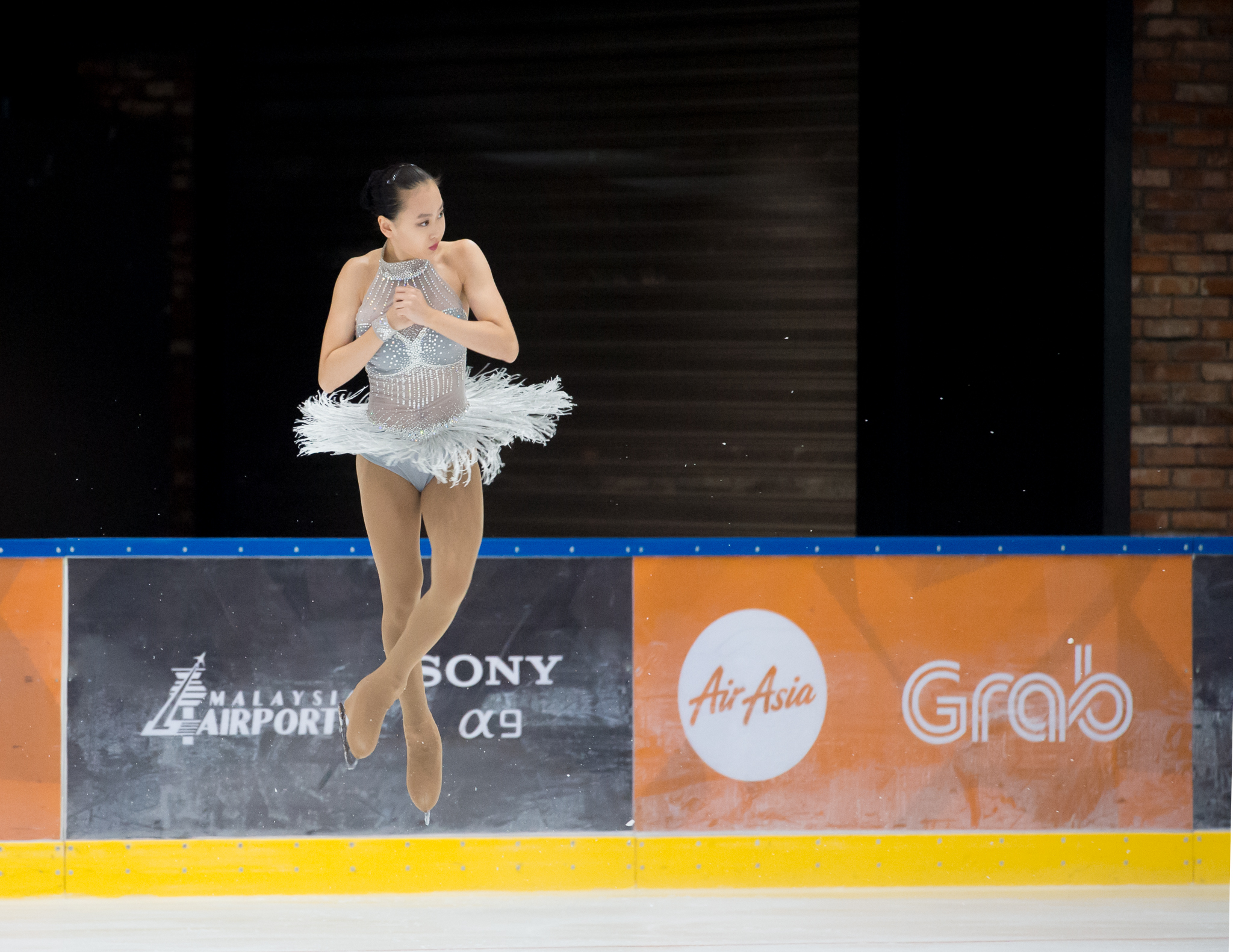 A Singaporean figure skater in action during the SEA Games at the Empire City Skating Rink.