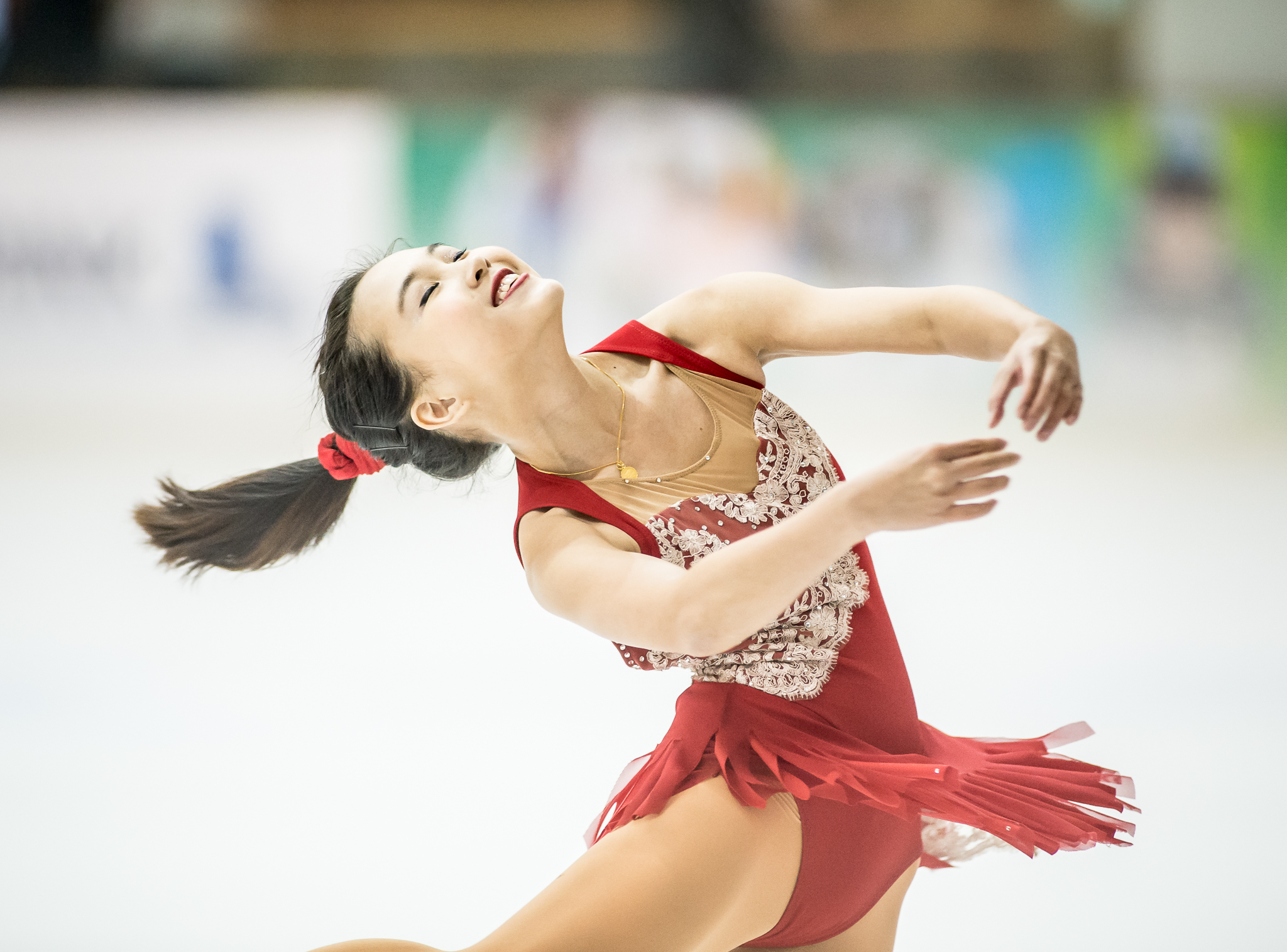 A figure skater executes a spin during the Singapore National Championships at the Rink.