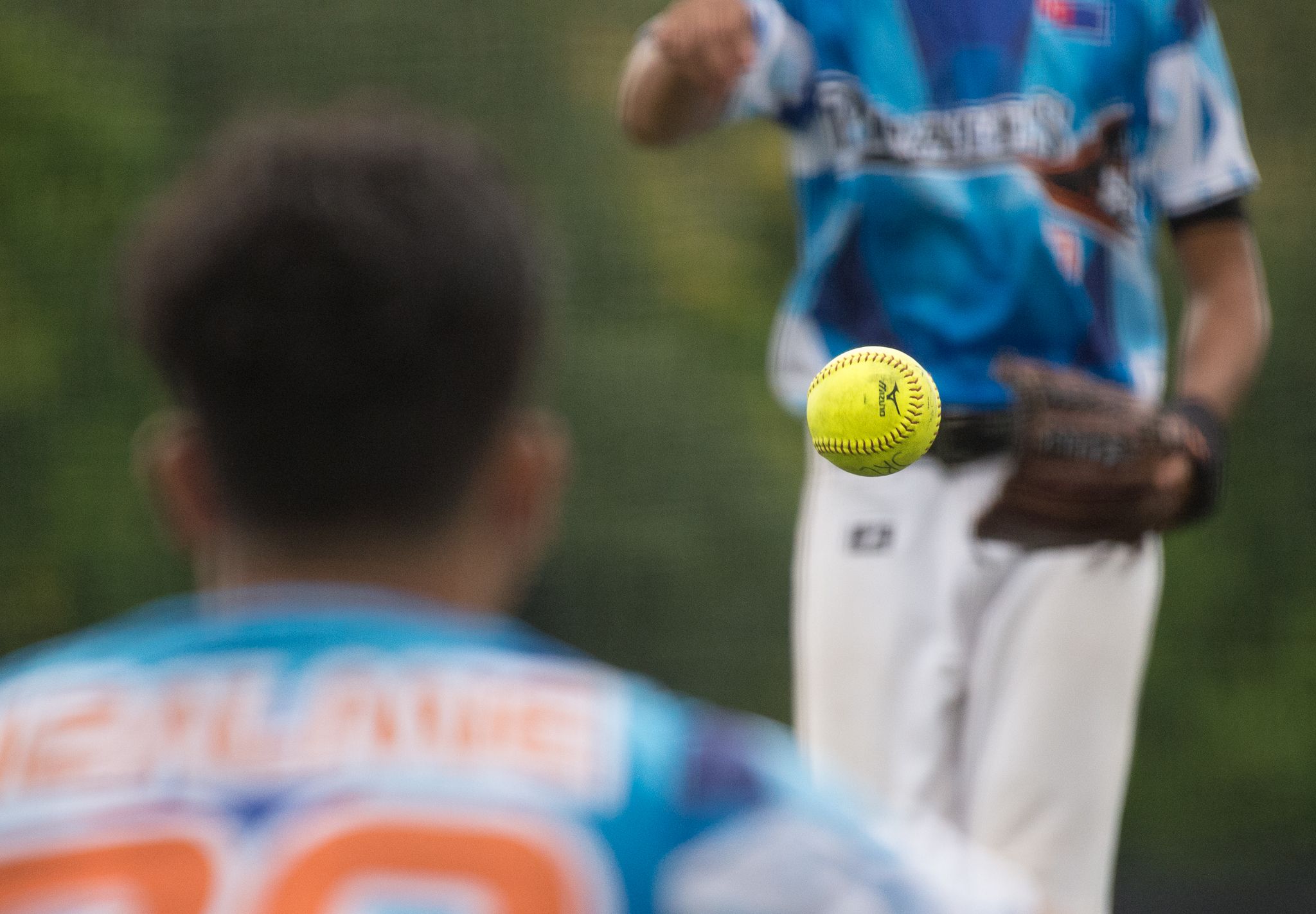 A Malaysian player watches the the ball during the ORA Gryphon Cup slow pitch tournament at Raffles Institution.