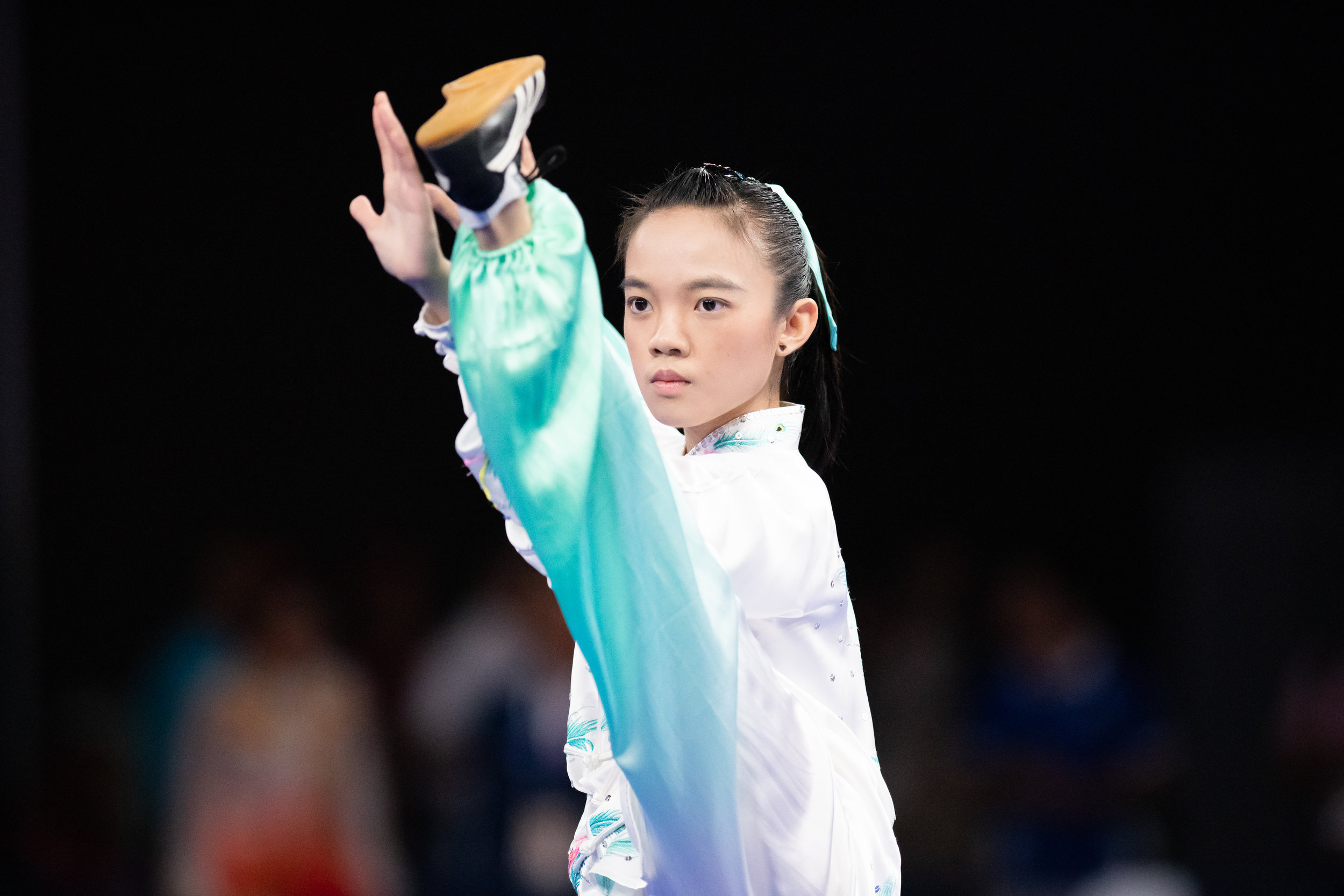 A Singaporean wushu exponent during the Women's Taijiquan event of the Asian Games at the Jakarta International Expo.