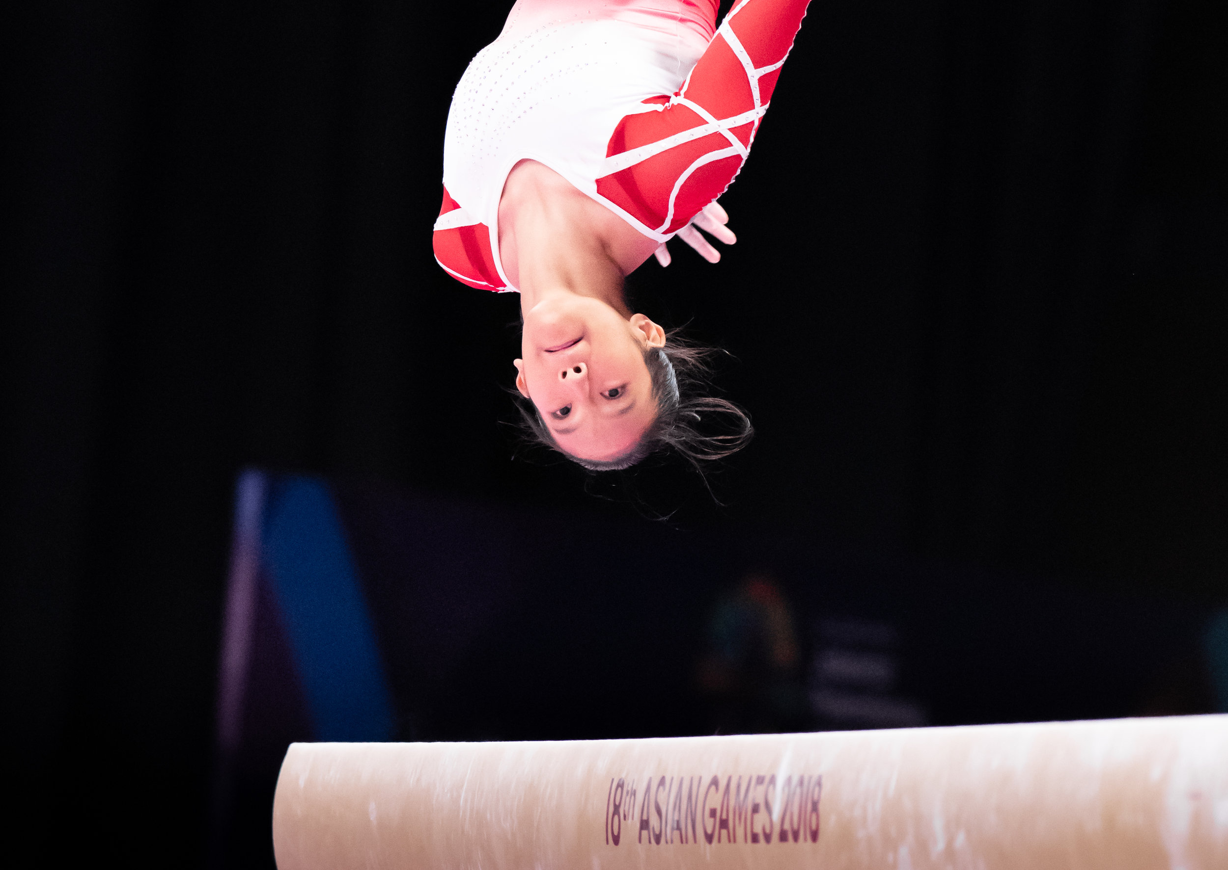 A Singaporean gymnast during the Women's Artistic Gymnastics Qualifiers of the Asian Games at the Jakarta Convention Centre.