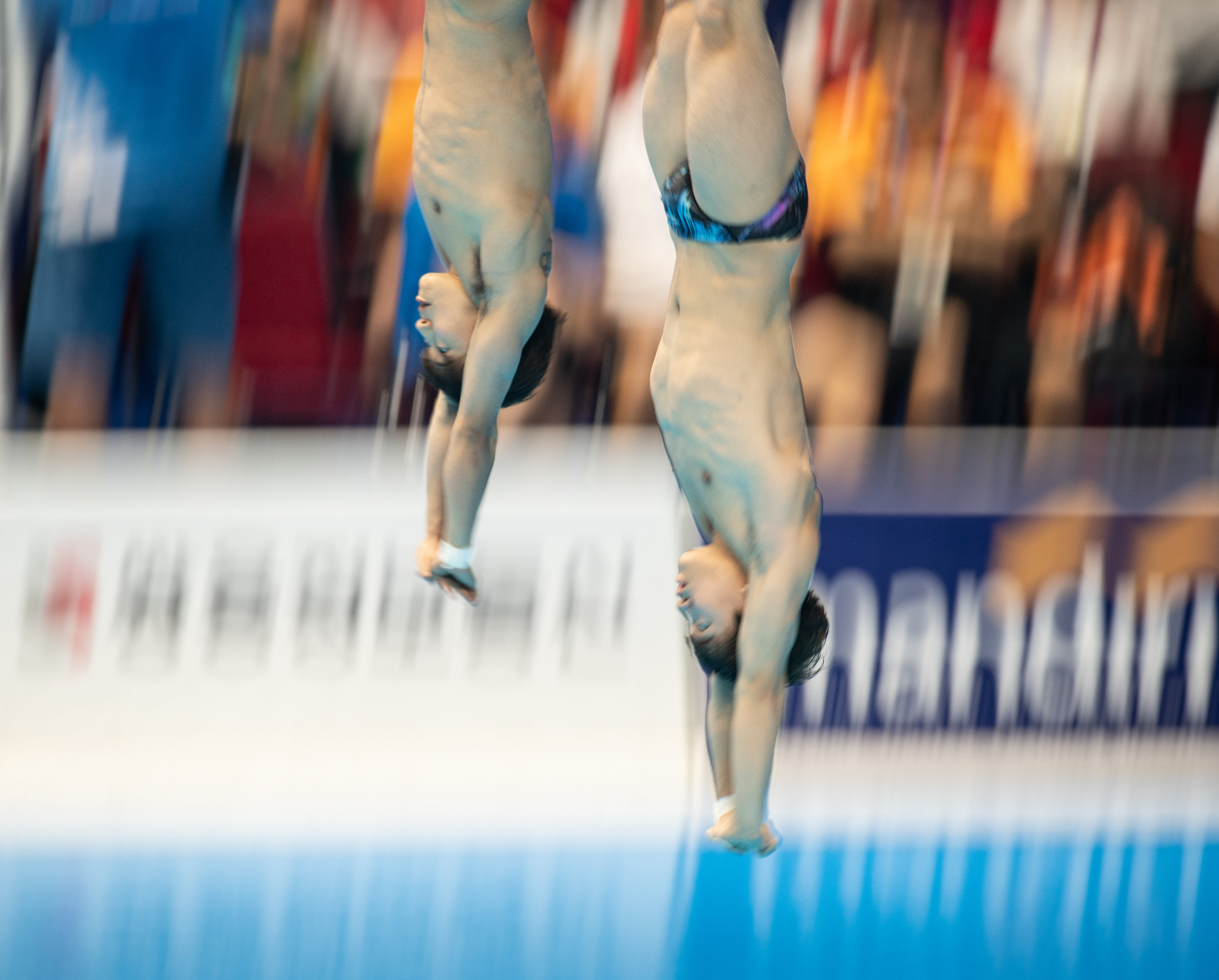 Korean divers during the 3m Synchronized Springboard Final of the Asian Games at the GBK Aquatic Centre.