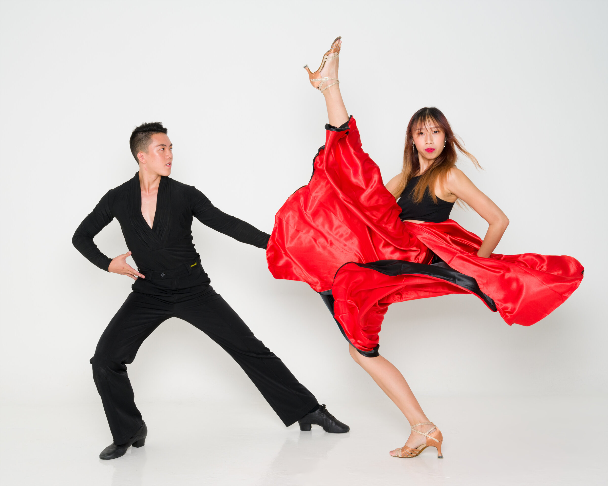 Two Latin Ballroom Dancers in the Studio