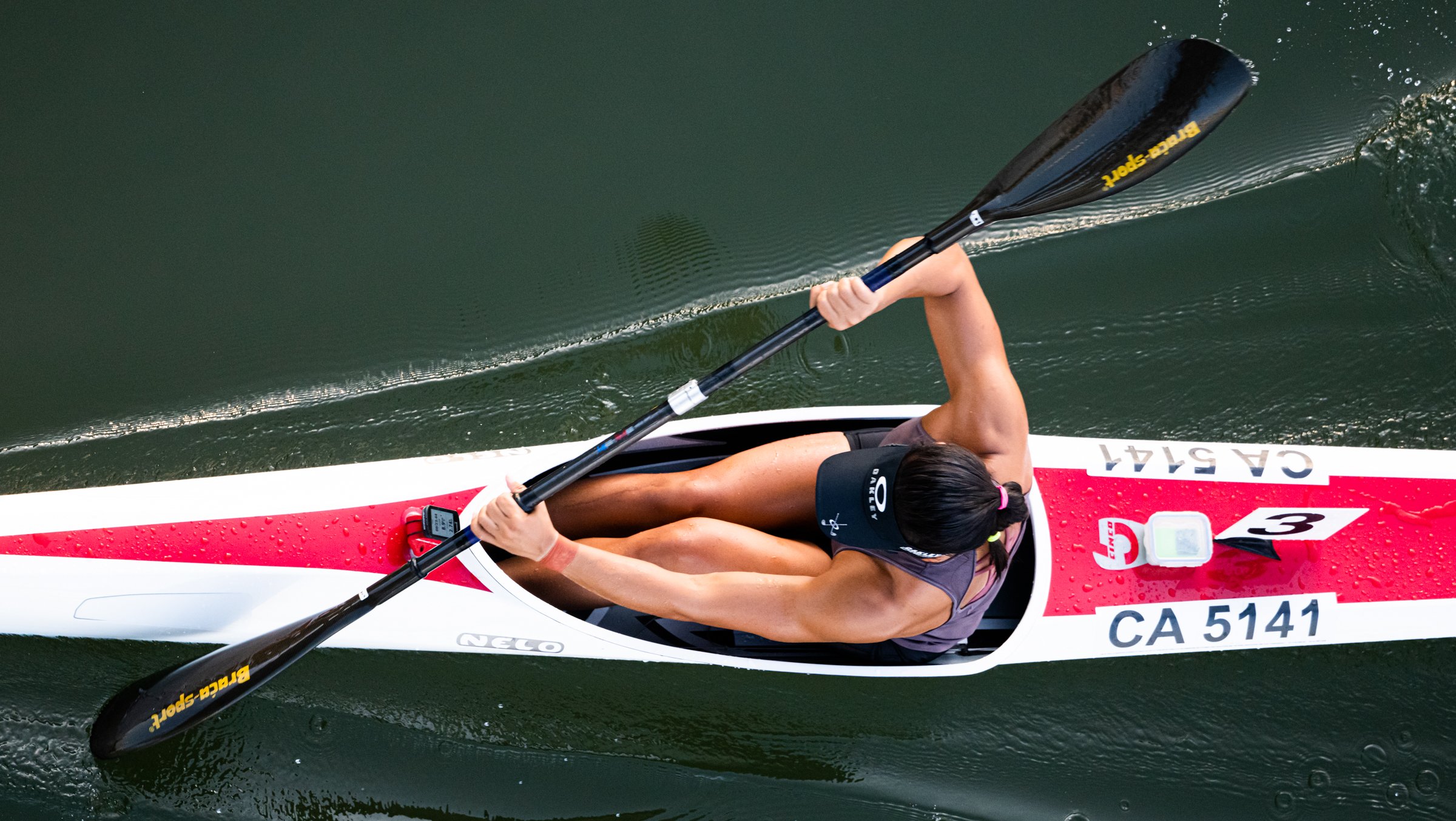 A Singaporean Kayaker paddles during the Singapore Sprint Cup at the Marina Channel.