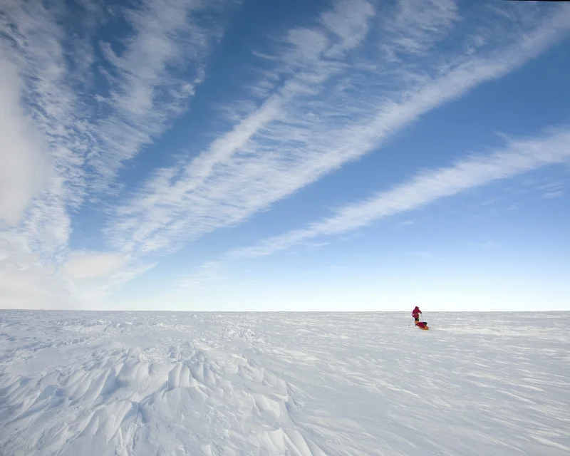 Ian treks across the barren ice dessert