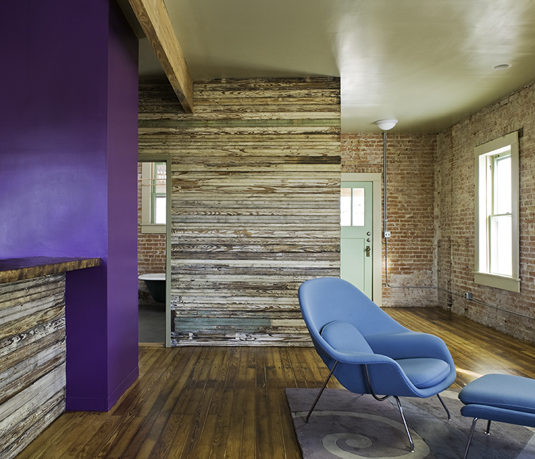 Living room with salvaged bead-board siding, residential loft, "El Picoso", San Antonio, Texas, 2008. Photo by Chris Cooper Photography