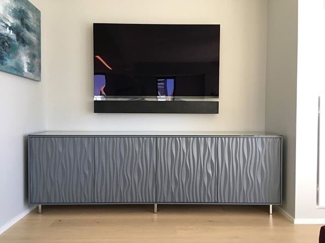 ⁠⠀
⁠Adding some texture and movement, a specialty material was used for the doors of this media unit.⁠⠀
⁠⠀
#custom #builtin #cabinetry #mediaunit