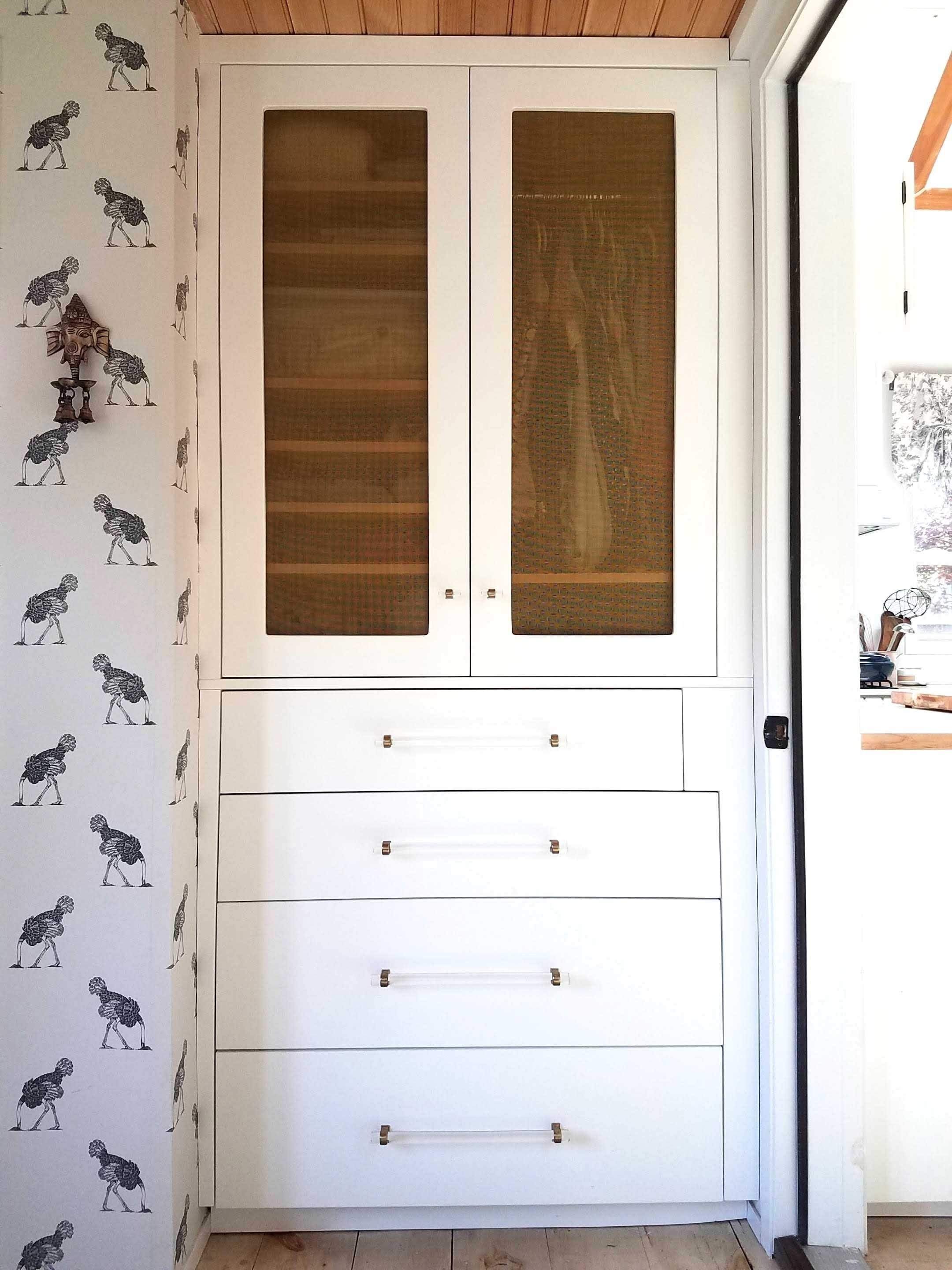 Cabinet with gold mesh