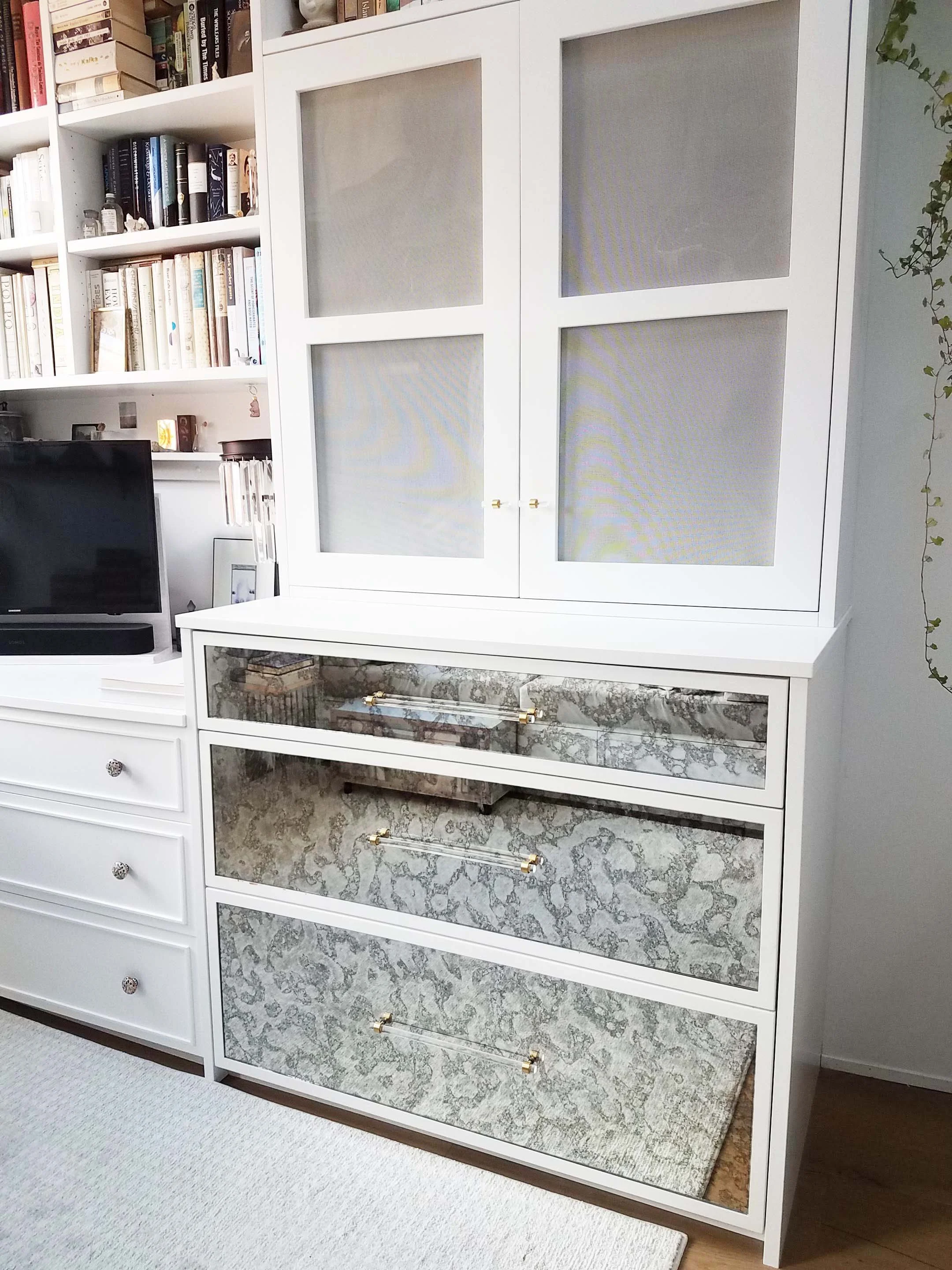 Antique mirrored dresser with mesh doors