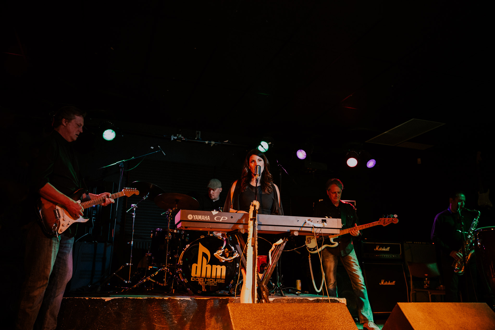 Rachel and The Ruckus band playing music on stage