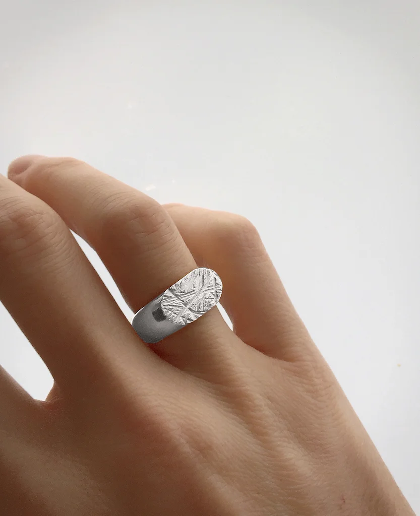RUDDOCK CERES RING SILVER WORN PRESS.jpg