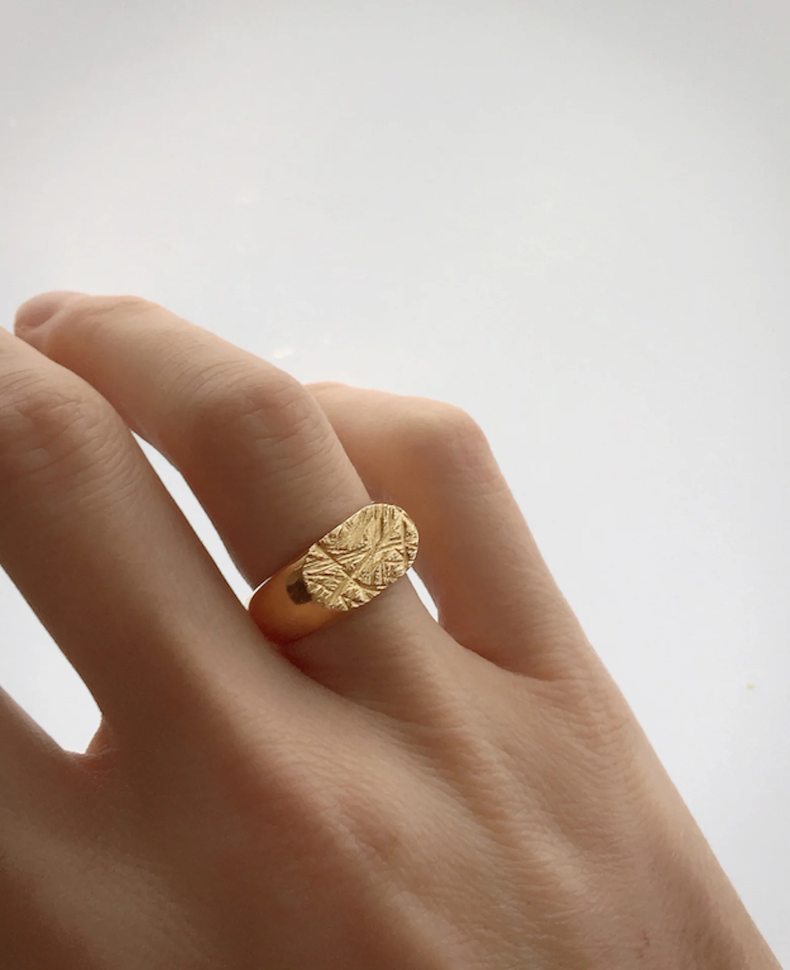 RUDDOCK CERES RING GOLD WORN PRESS.jpg