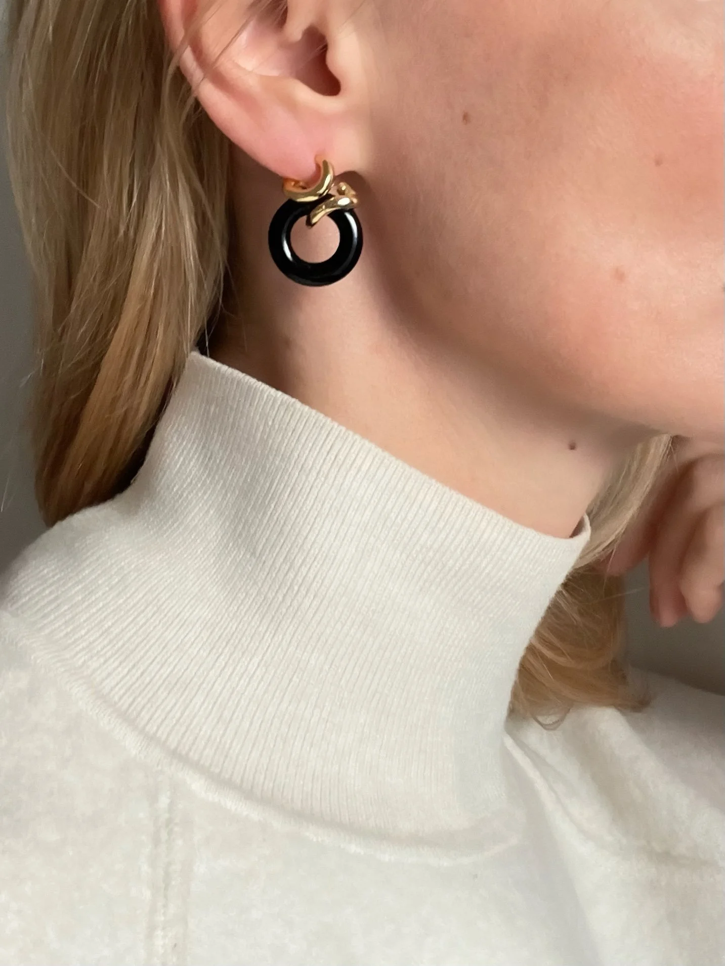 A model wearing black onyx hoop earrings (Copy) (Copy)