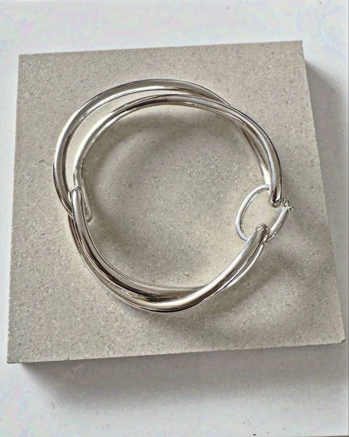 Soma. Our new favourite bracelet comprised of two twisted halves, giving fluid movement with weighty presence . 

Handcrafted in solid sterling silver