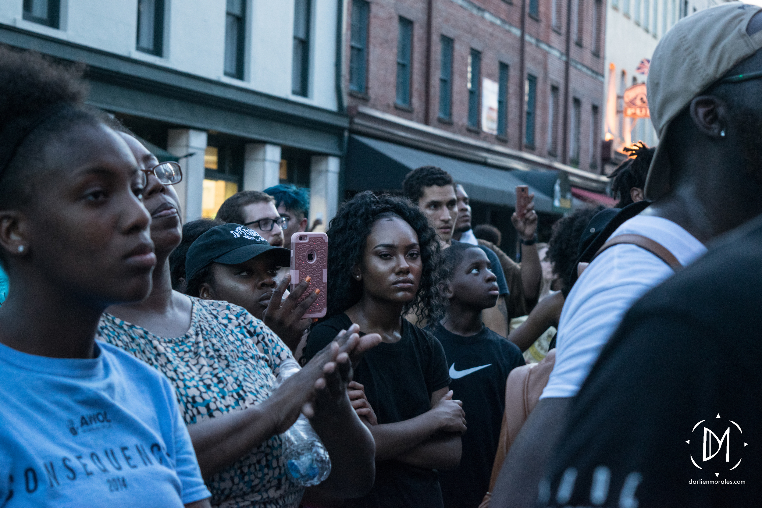   People stand to listen to the speech.    -July 7, 2016  