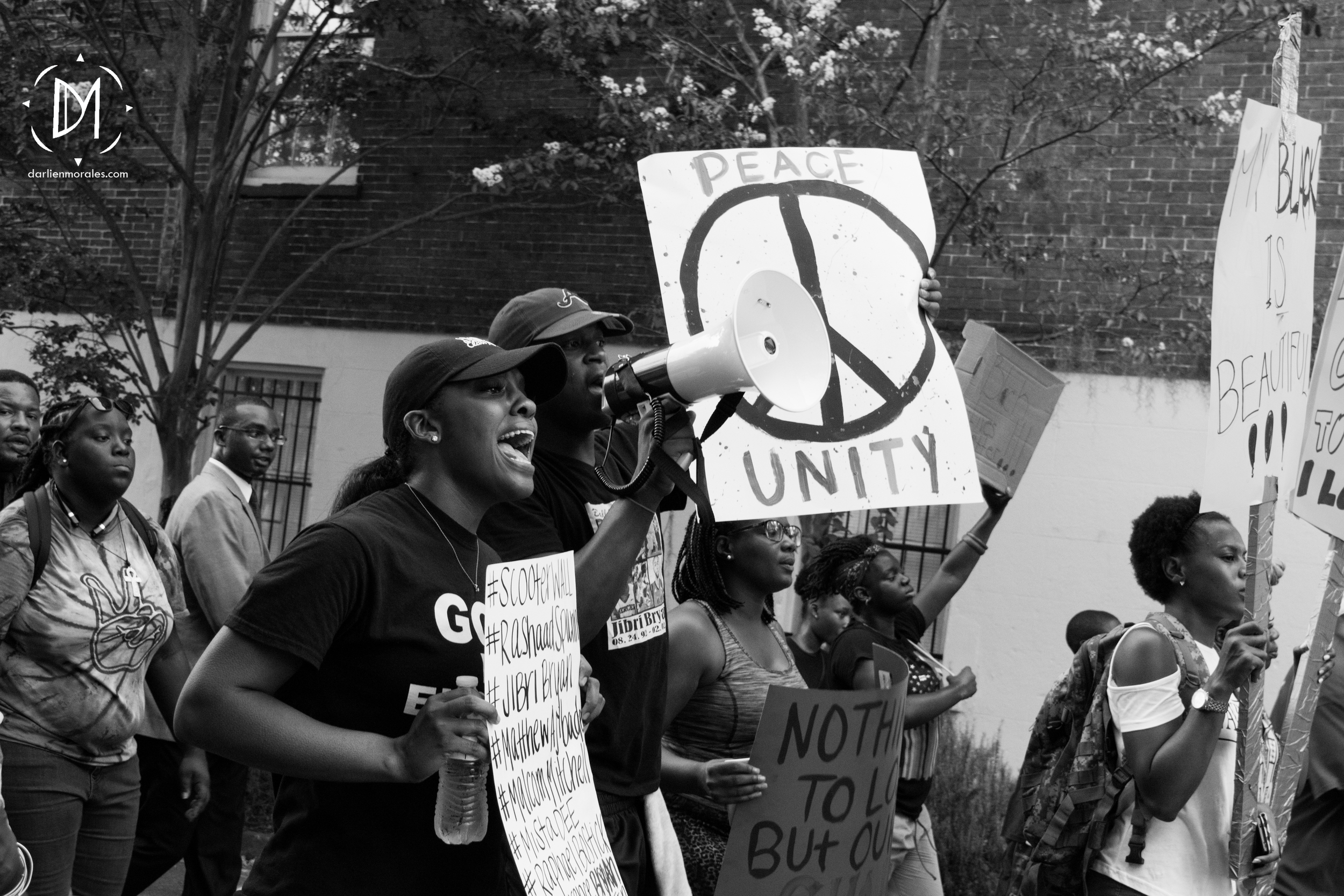  Linda Wilder Bryan, organizer of the march and member of Savannah MOMS,&nbsp;chants "No Justice, no peace"&nbsp;with the crowd.&nbsp;  -July 12, 2016 