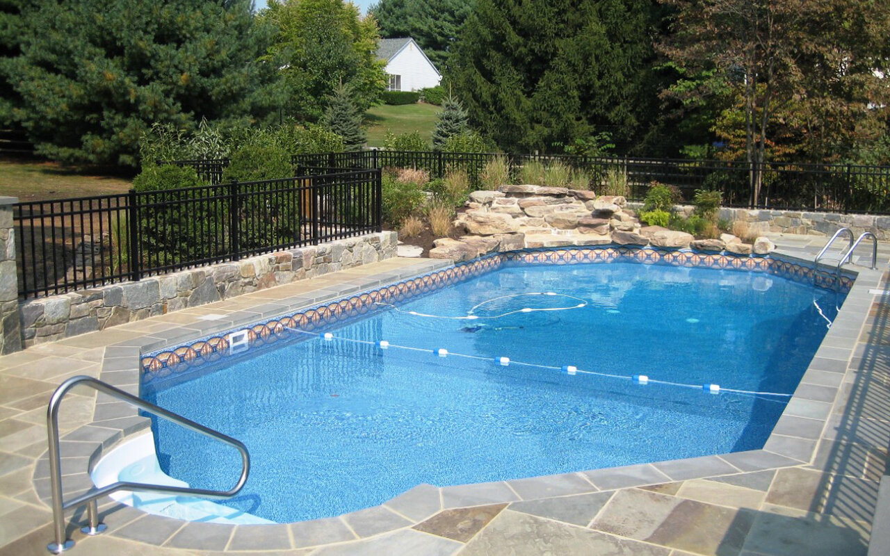  This is an approximately 30-year-old pool of which the client acquired when they bought the house. They reached out to Browning with a goal - to make the pool “their idea” of a backyard swimming pool. 