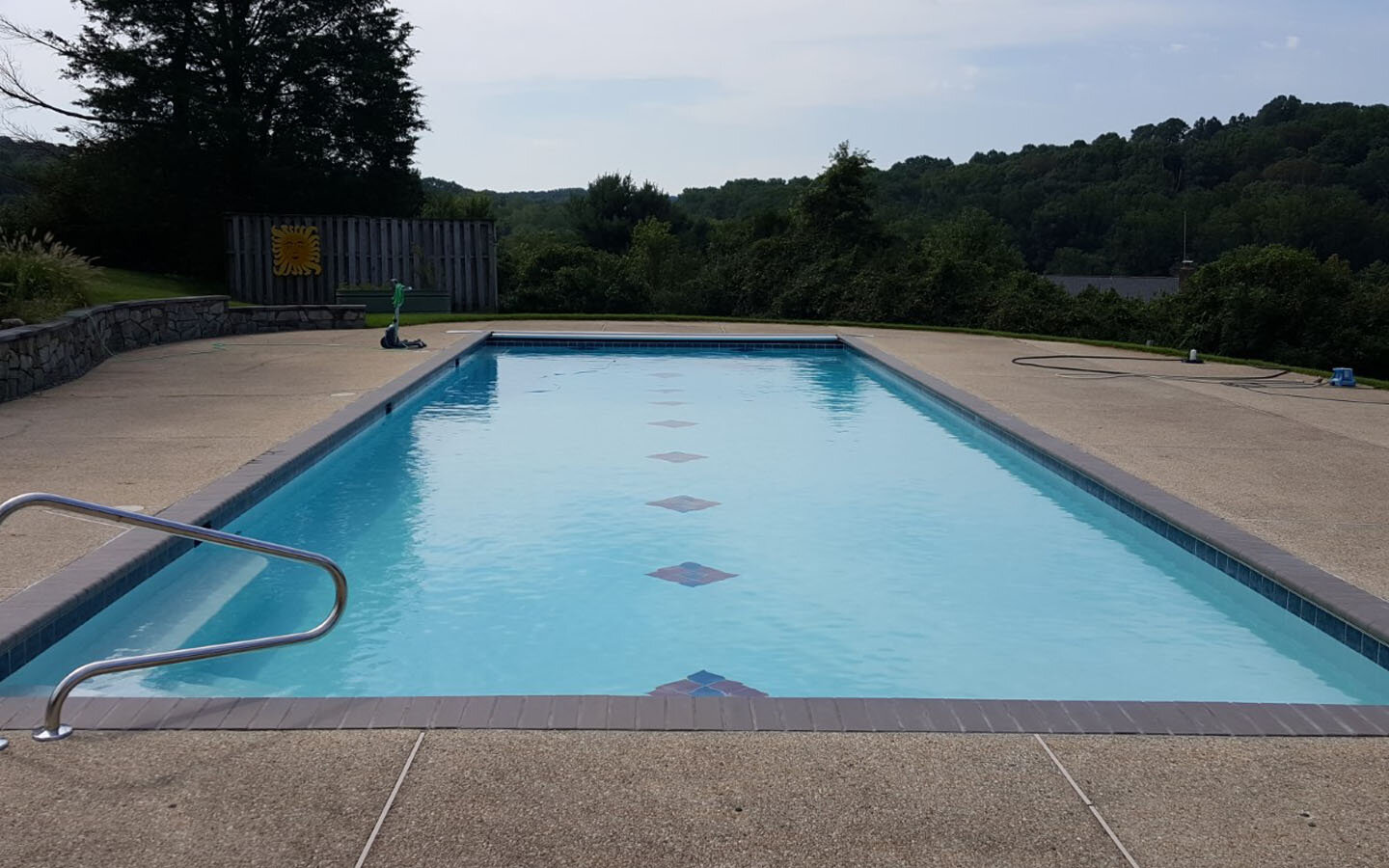  New life to an old pool! This pool was brought around with new coping, tile, and a bleach cleaning of the existing interior to preserve the mosaic tile inlays. 