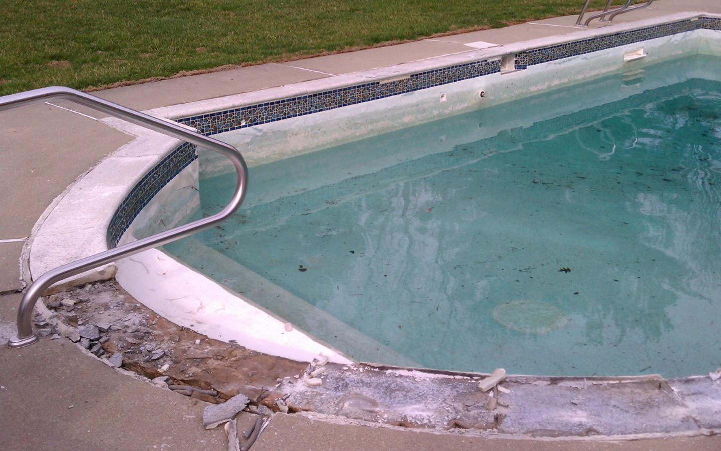  The rotted concrete areas of the pool structure are removed. 