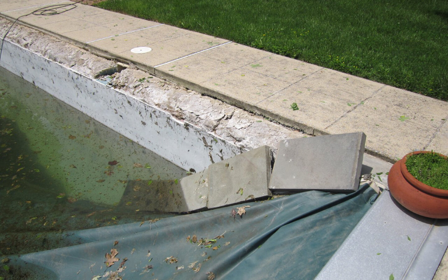  Here is another example of structural beam failure caused by damaged waterline tile. Because the tile was left in disrepair, over time the bond beam became saturated. Once the bond beam is saturated and the winter weather kicks in with freezing temp