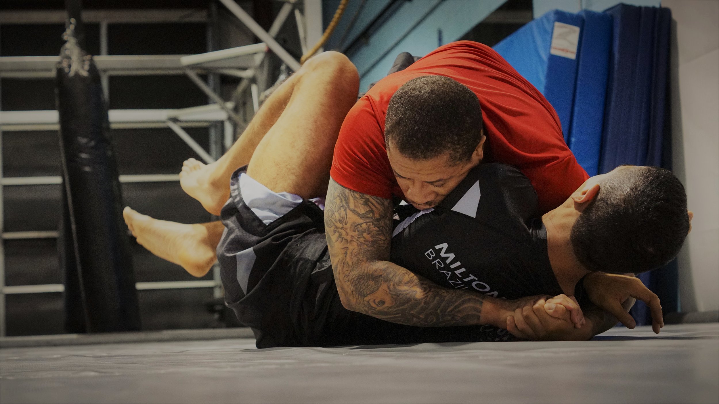 Brazilian jiu-jitsu instruction Reggie and Ale edit.jpg