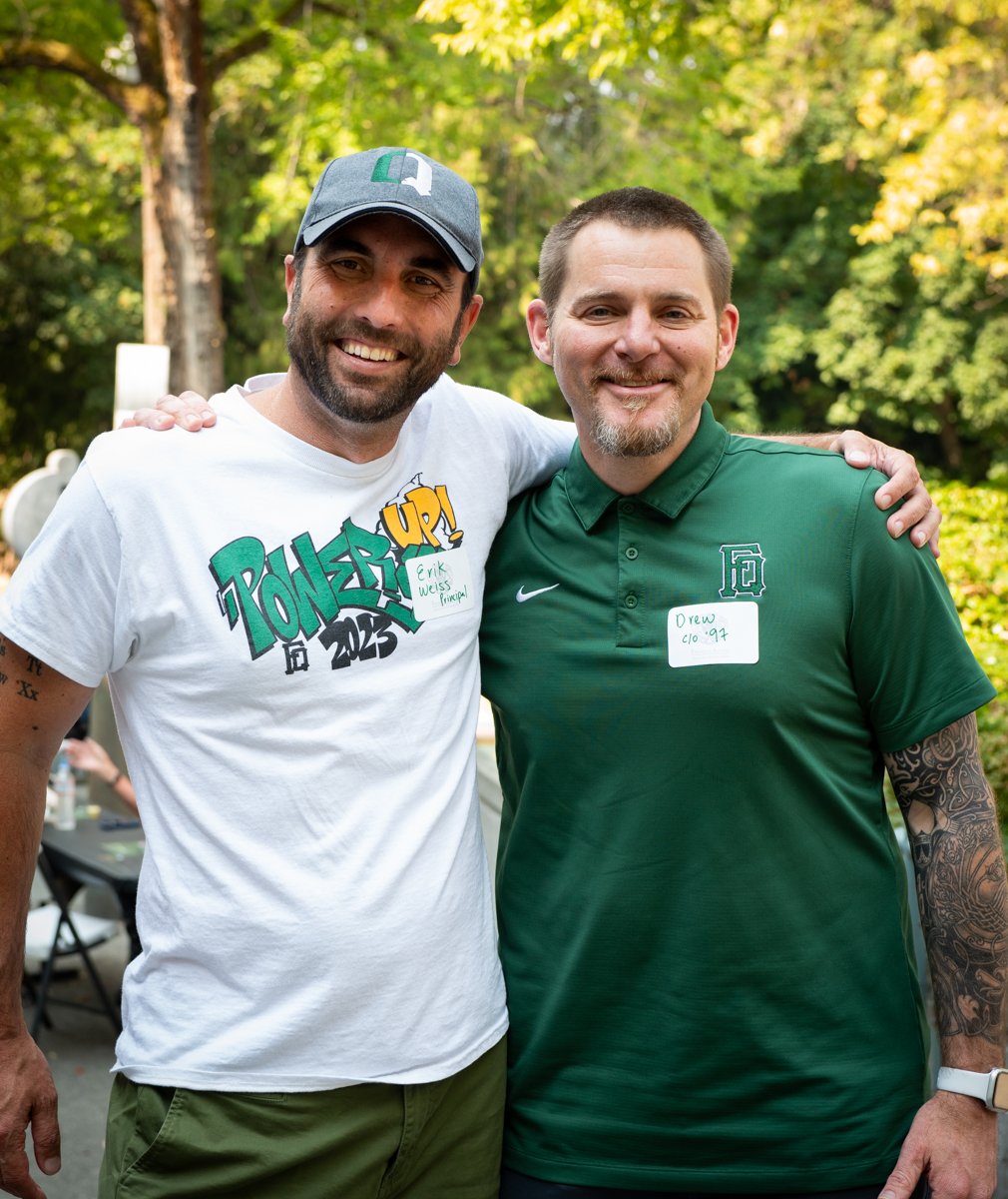   Principal Erik Weiss with former principal and board member Drew O’Connell, ’97  