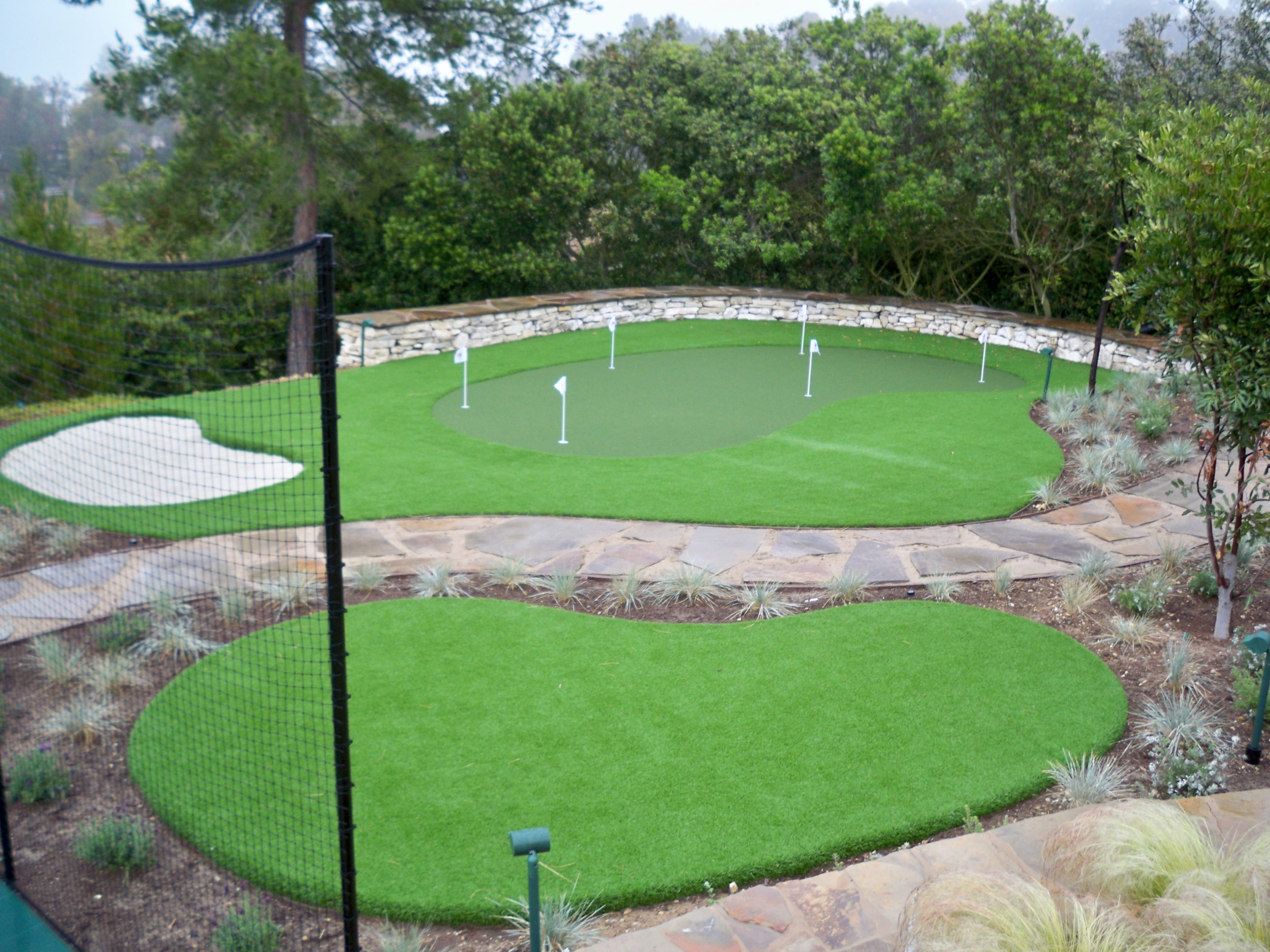 Synthetic grass with putting green