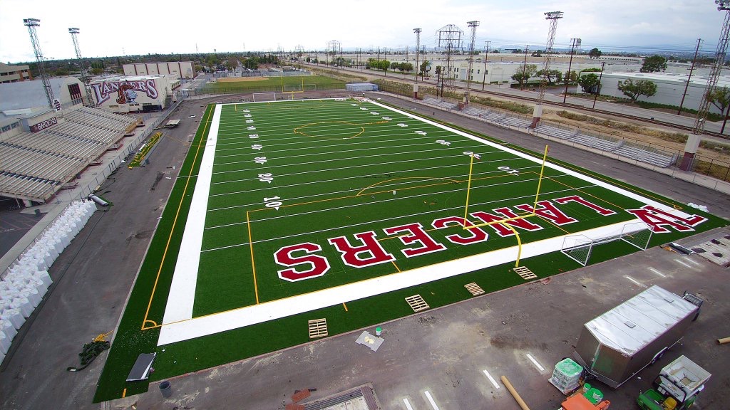 Synthetic artificial grass football field