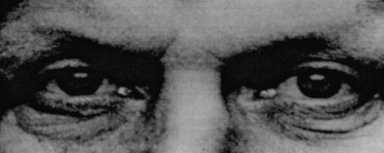 An example photograph from the RMET. What emotion is this male displaying? Choose one of the following: Serious (correct), Ashamed, Alarmed, Bewildered.