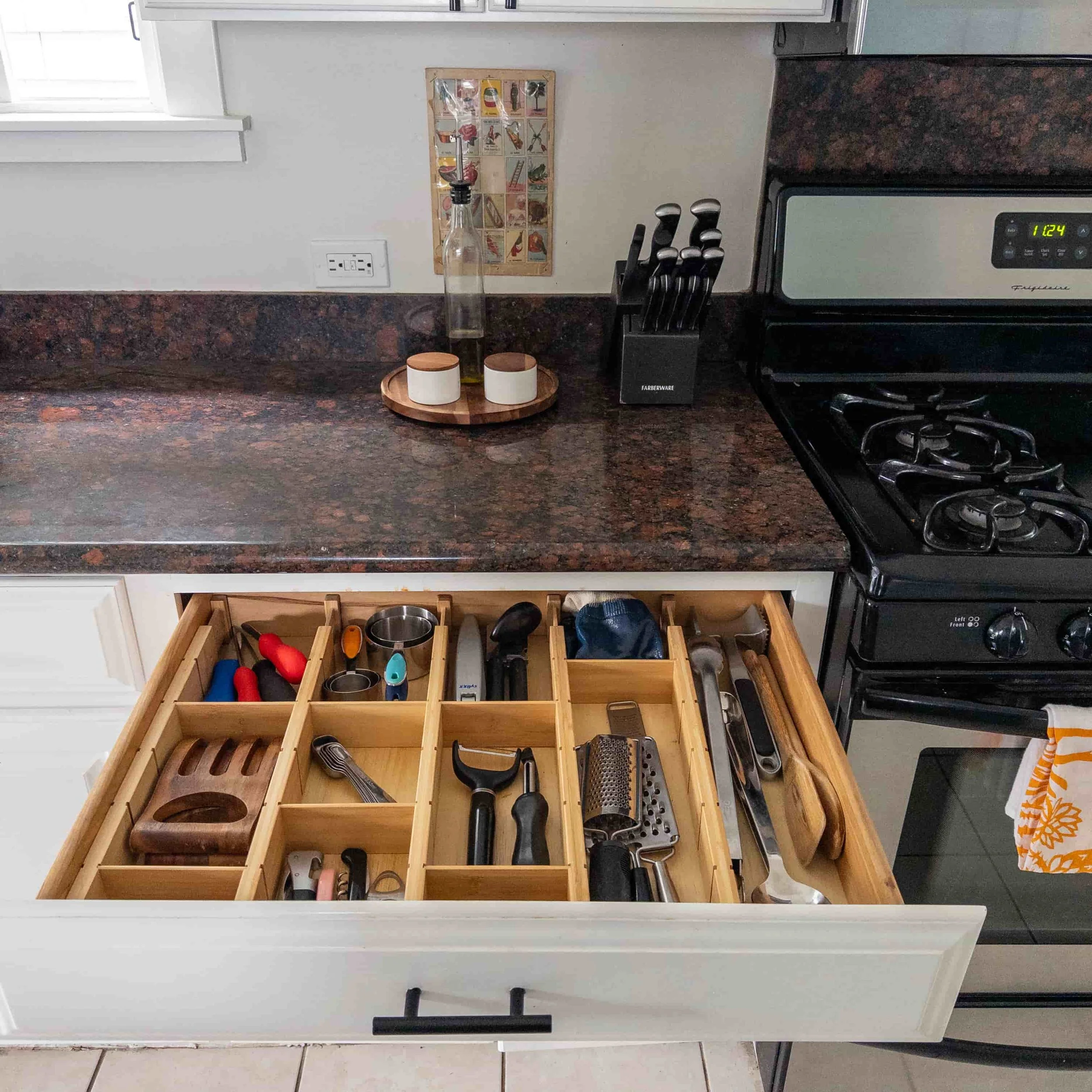 Kitchen Drawer organized with cooking utensils and Counter with Knife Block and Condiment Lazy Susan
