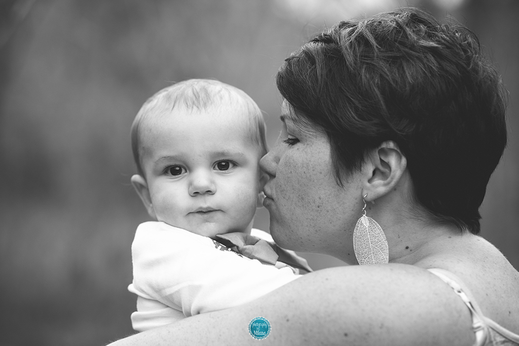 Mom kissing Micah