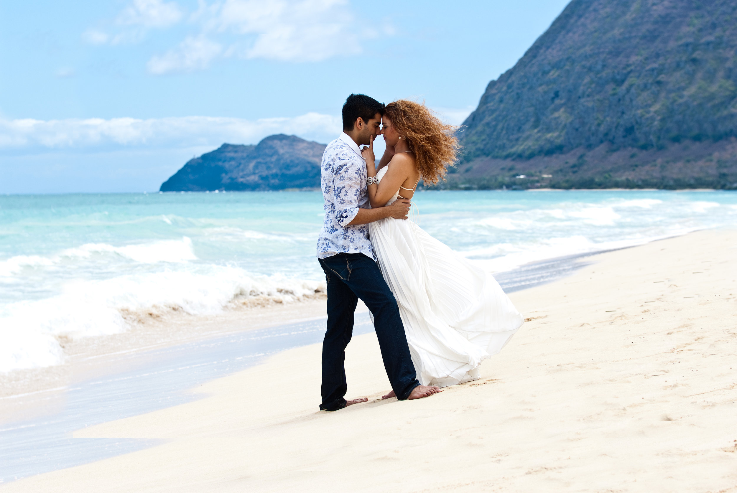 Alone together on a deserted beach.