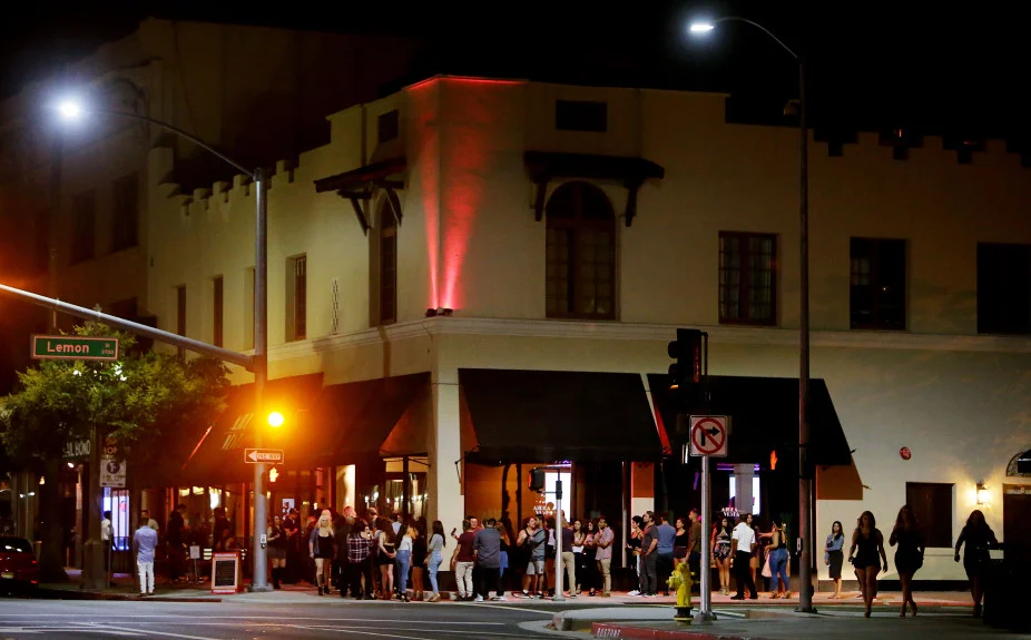 The line to get into Aurea Vista Bar & Night Club goes around the building Saturday night, Aug. 19.