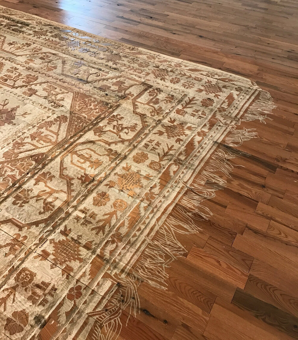 “Childhood Memories” (2017), hand-carved rug into utility oak wood floor